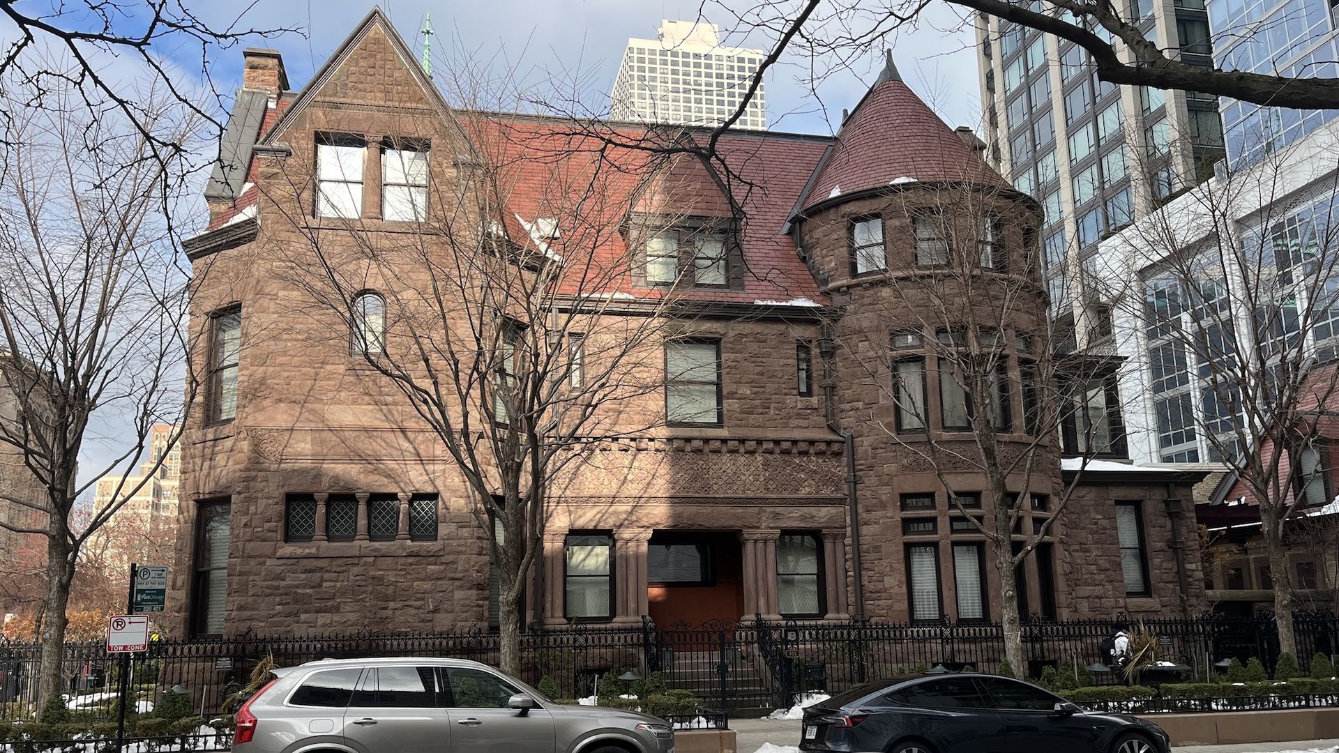 Romanesque-style multi-story home.