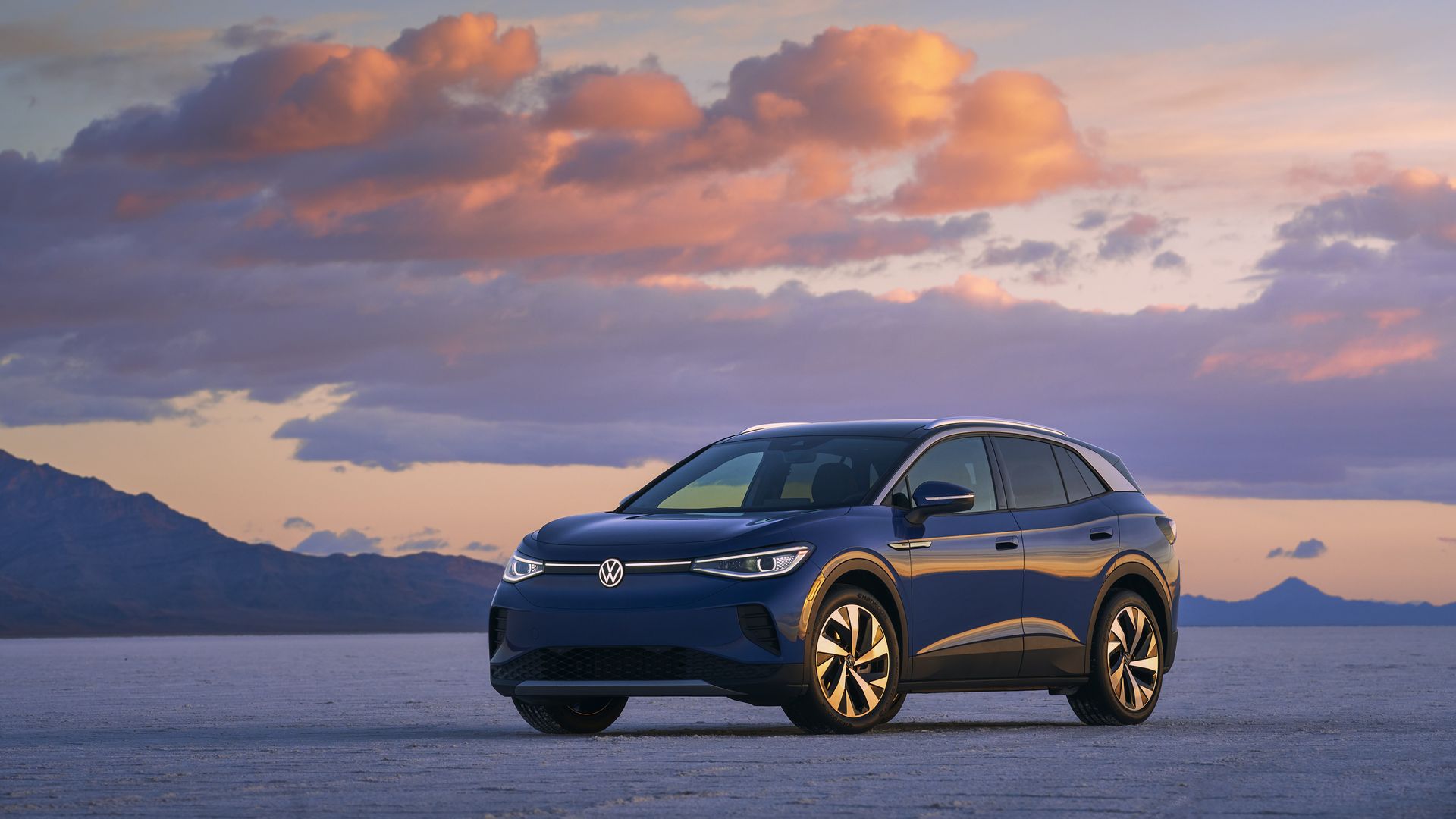 Image of Volkswagen ID.4 electric crossover SUV with mountains in the background.