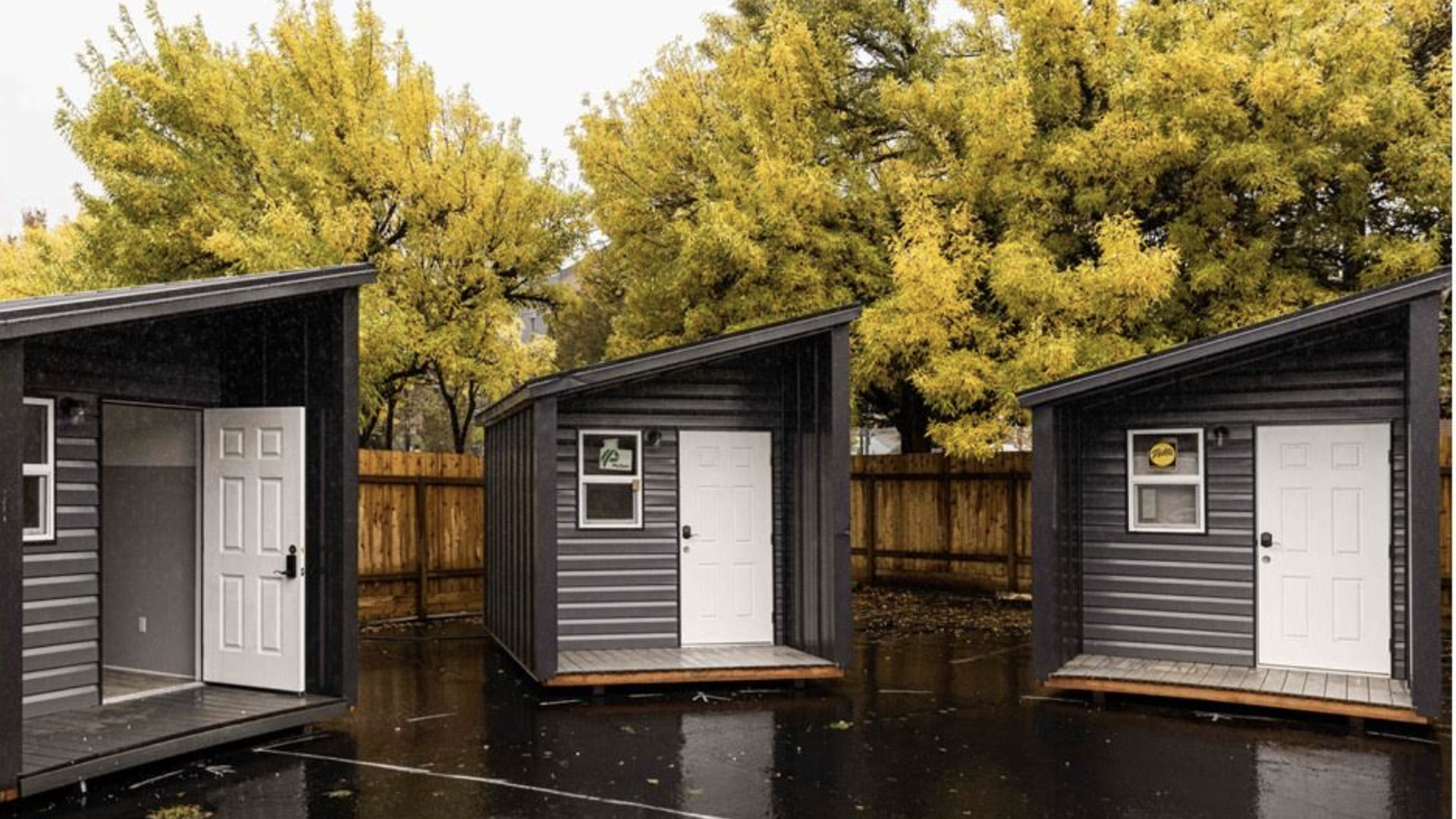 A photo of three tiny homes.