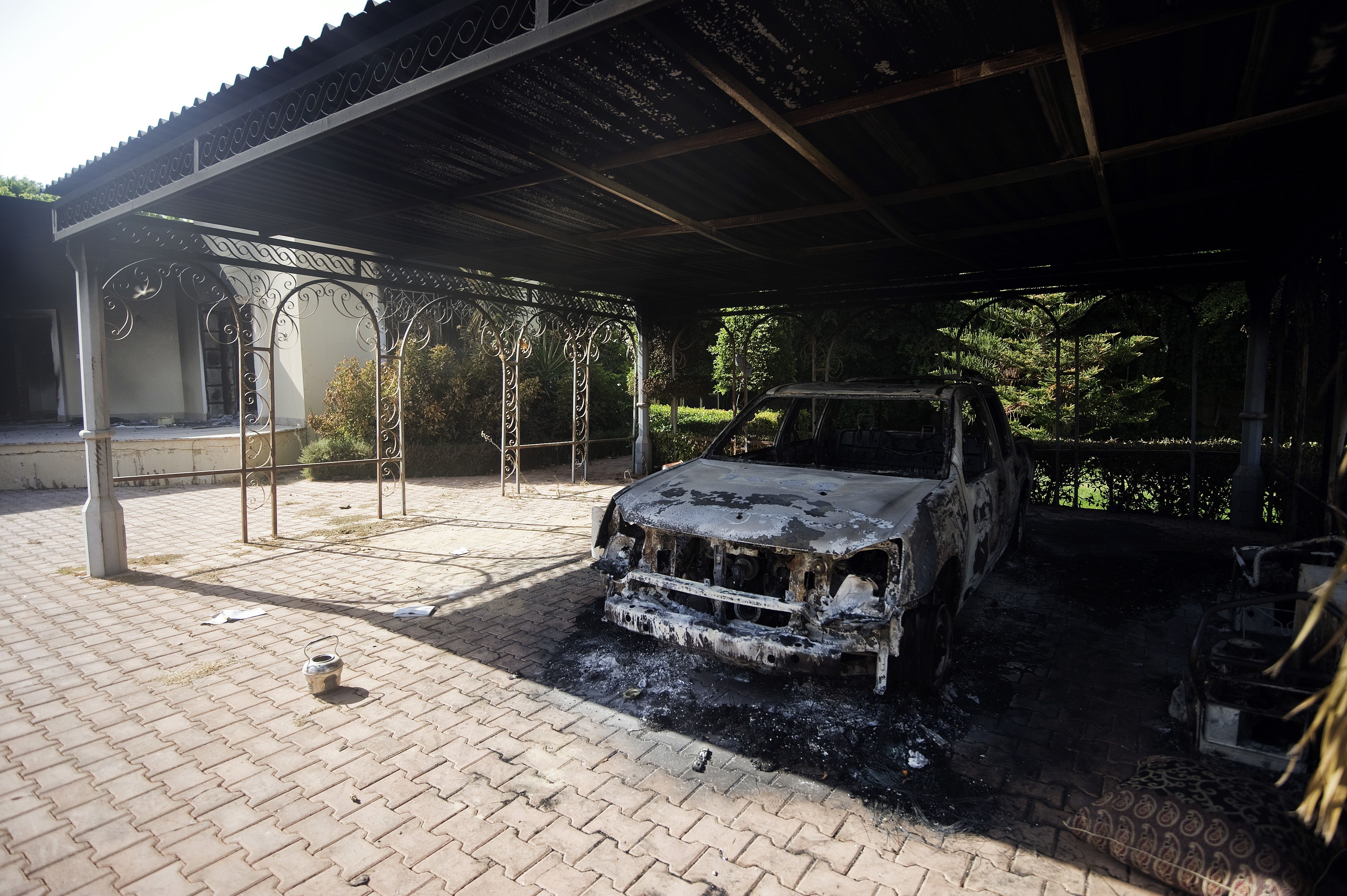 A picture shows a burnt vehicle inside the US consulate compound in Benghazi on September 13, 2012