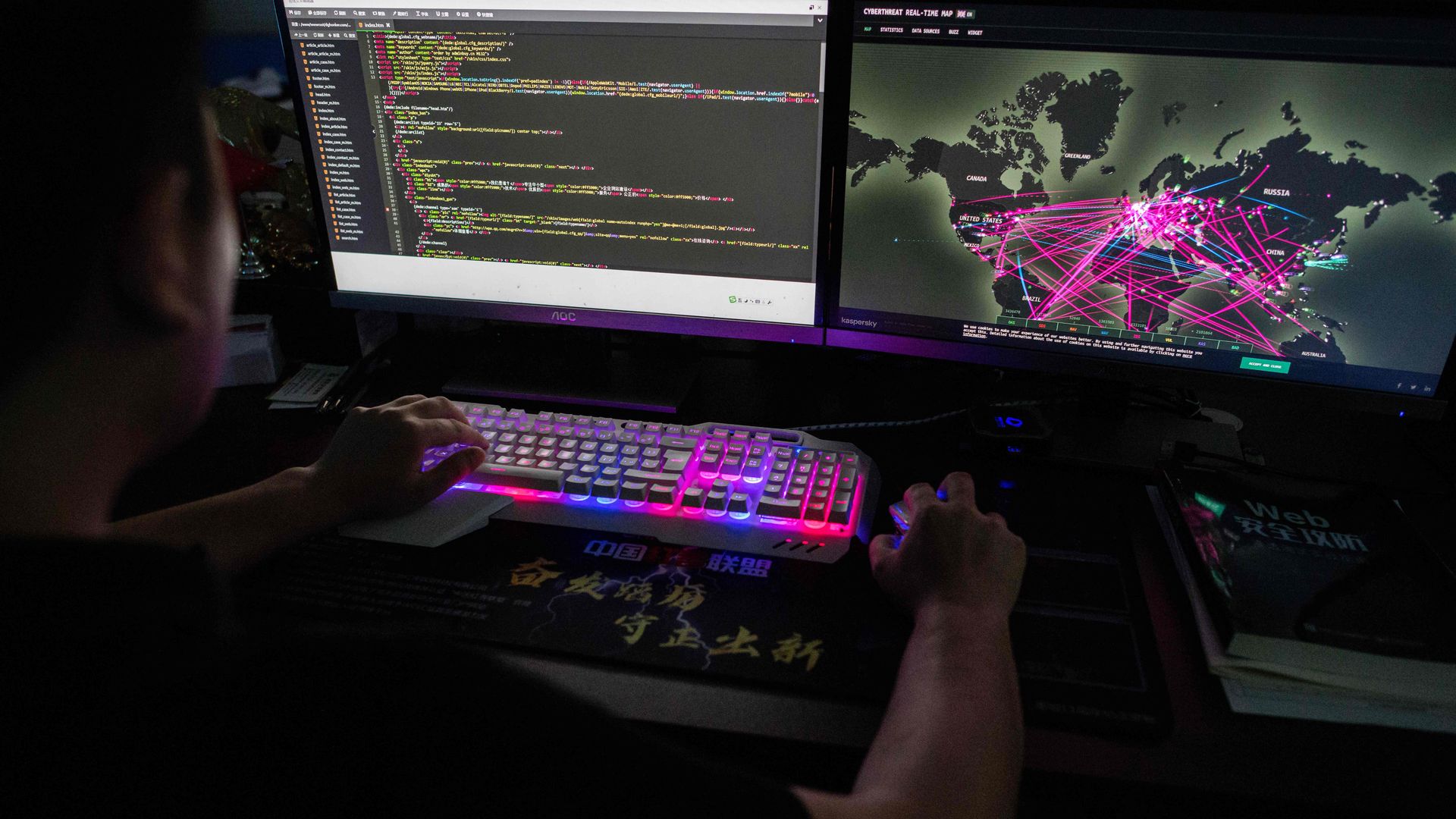 Prince, a member of the hacking group using a website that monitors global cyberattacks on his computer at their office in Dongguan, China's southern Guangdong province in 2020