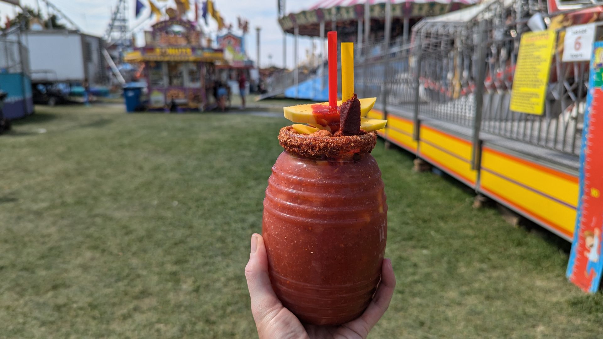 A raspado shaved ice drink with tajin and fruit.