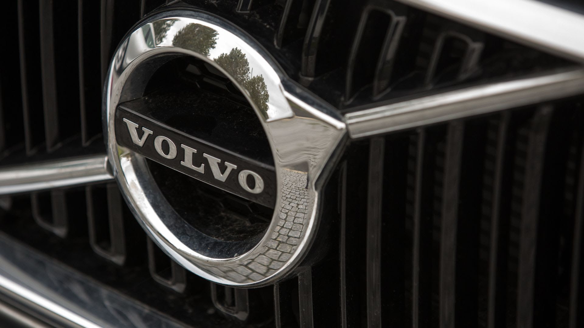 Tight shot of the Volvo logo on a car