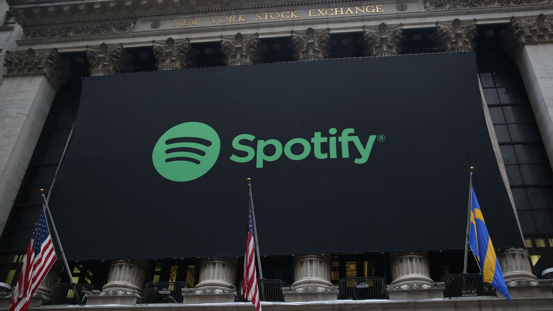 Spotify logo above the NYSE.