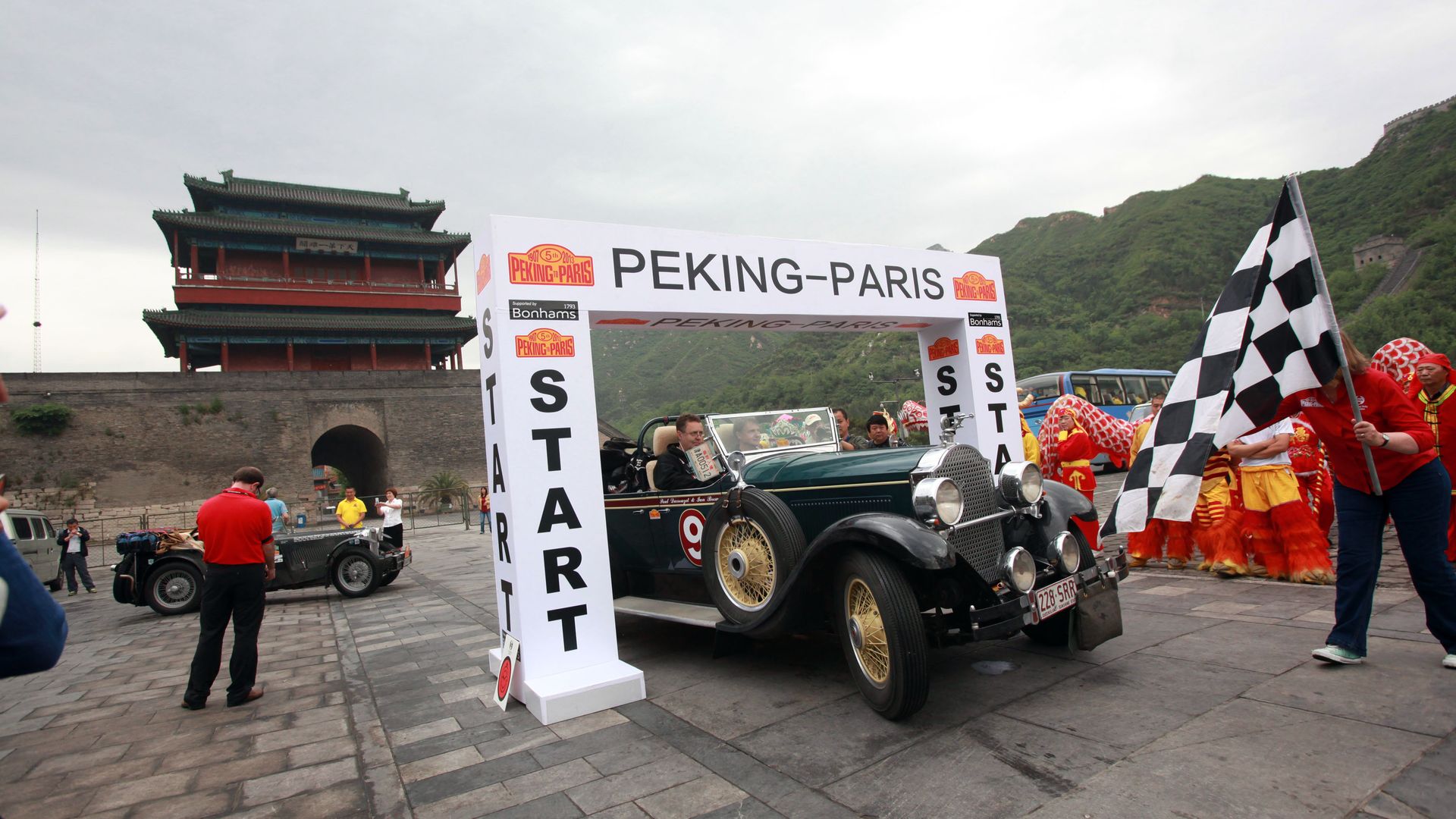 A car gets flagged off at "Peking to Paris"