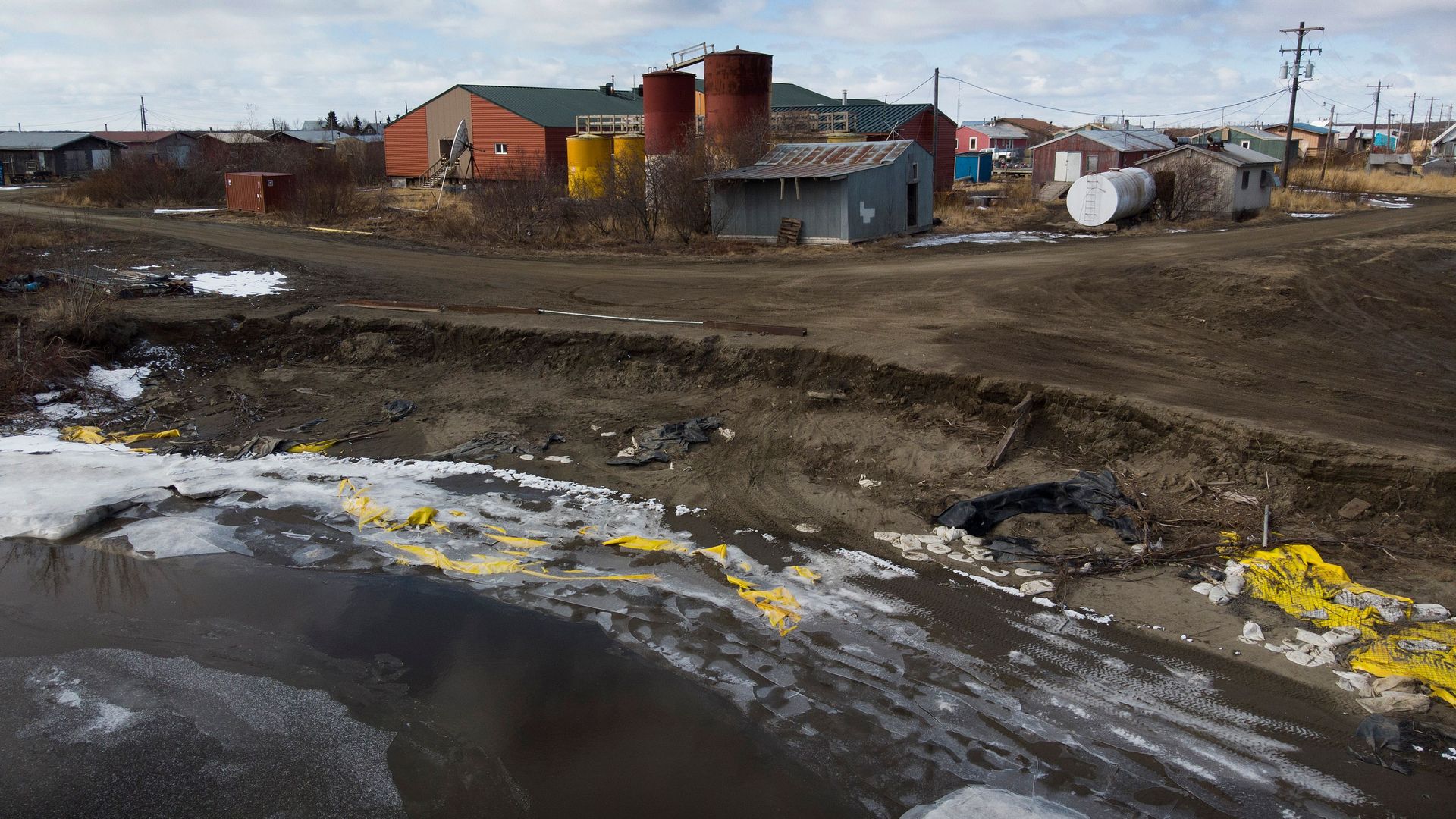 Severe erosion of the permafrost tundra threatens a school at Yupik Eskimo village of Napakiak in the Yukon Delta, Alaska on April 18, 2019.