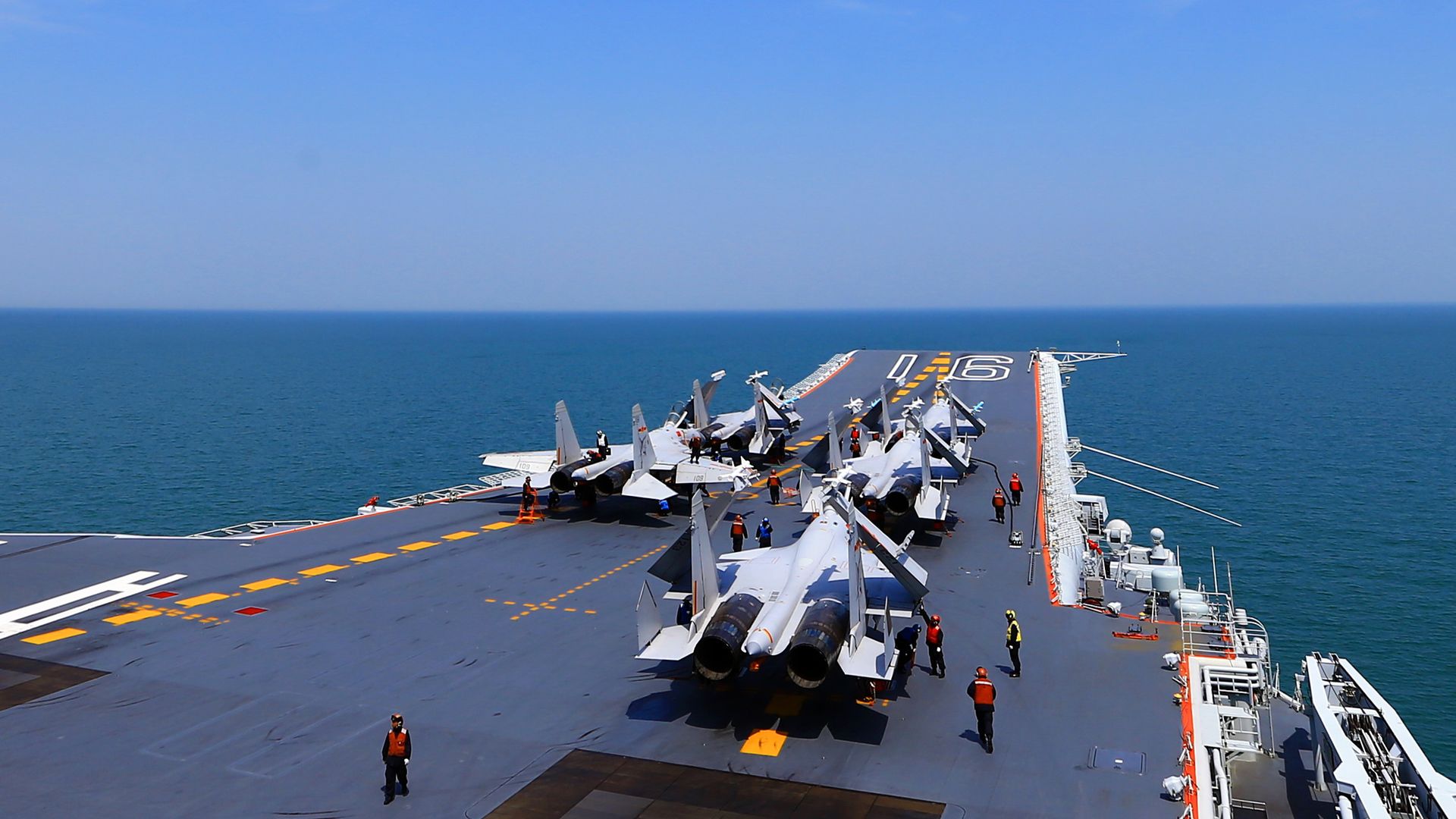 An aircraft carrier on the horizon