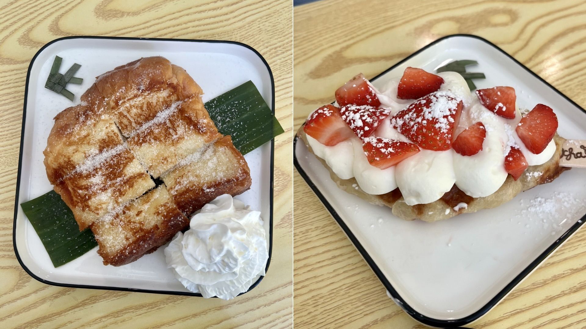 Two dessert plates: left has sliced toasted bread with powdered sugar and whipped cream, right has a fried pastry topped with whipped cream, fresh strawberries, and powdered sugar on a light wood table.
