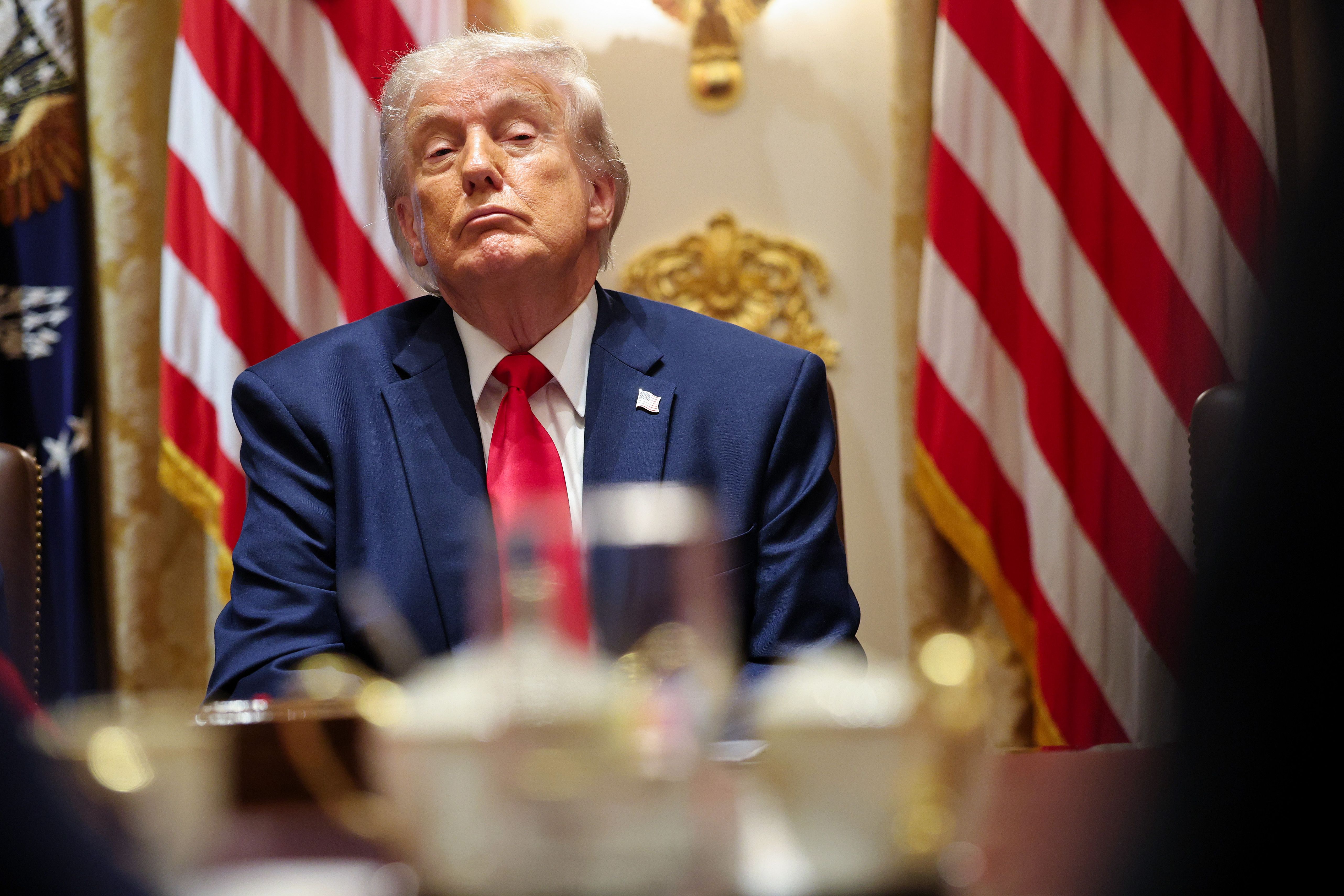 Donald Trump looks on during a Cabinet meeting in the White House