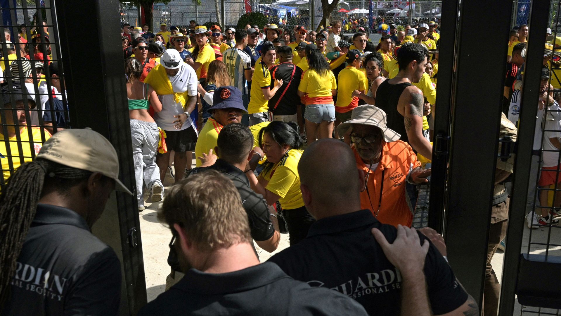 Security personnel look on at the crowds at the Copa America final at Hard Rock Stadium,