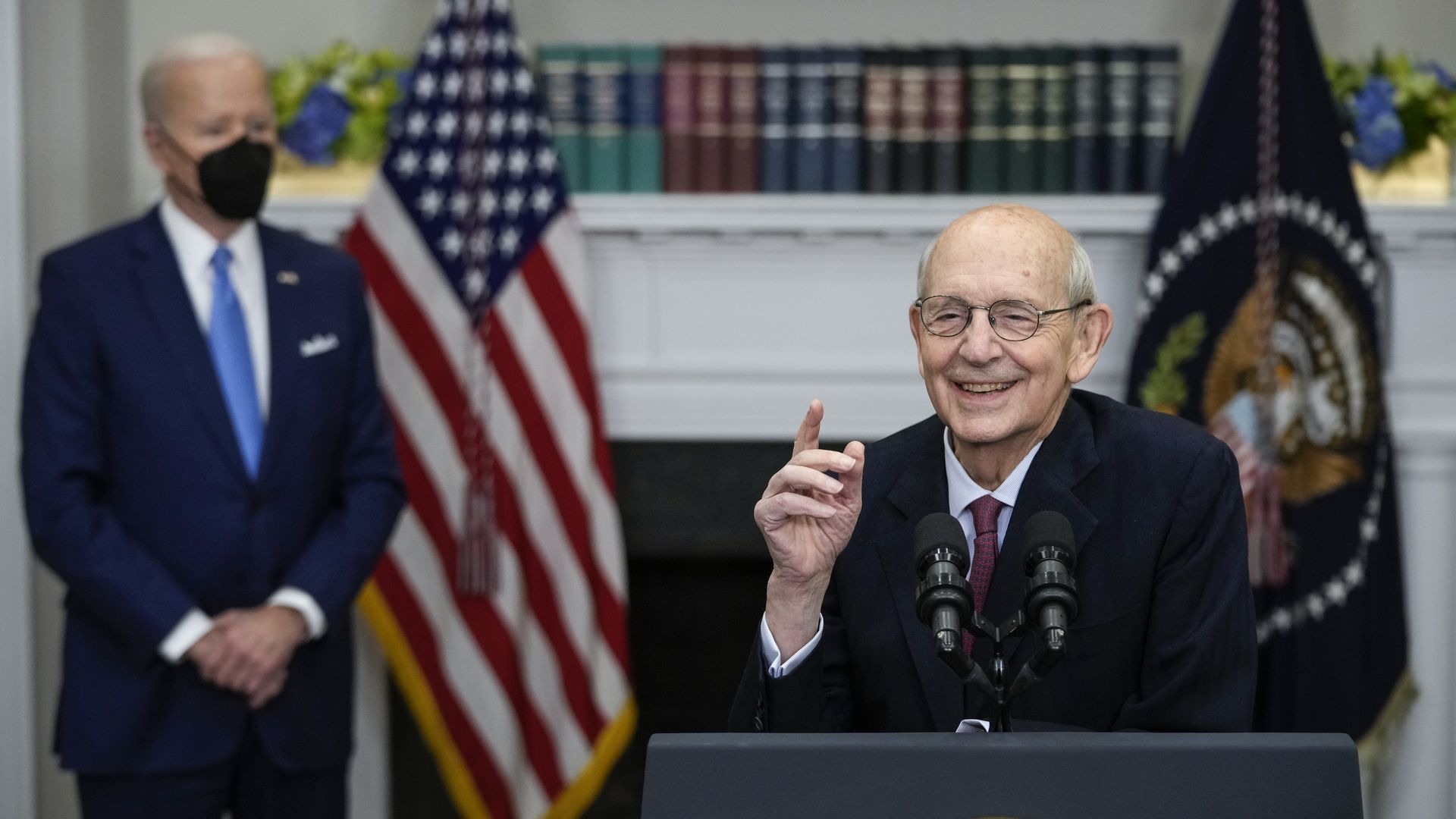 President Biden is seen watching as Supreme Court Justice Stephen Breyer announces his retirement last month.