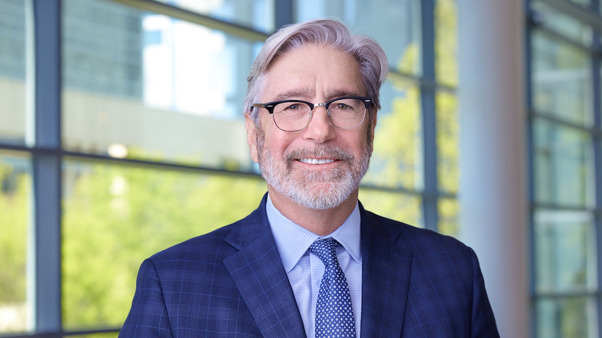 caption: Tom Murray likes to start his morning early with a cup of coffee and the paper. Photo courtesy of the Charlotte Regional Visitors Authority.