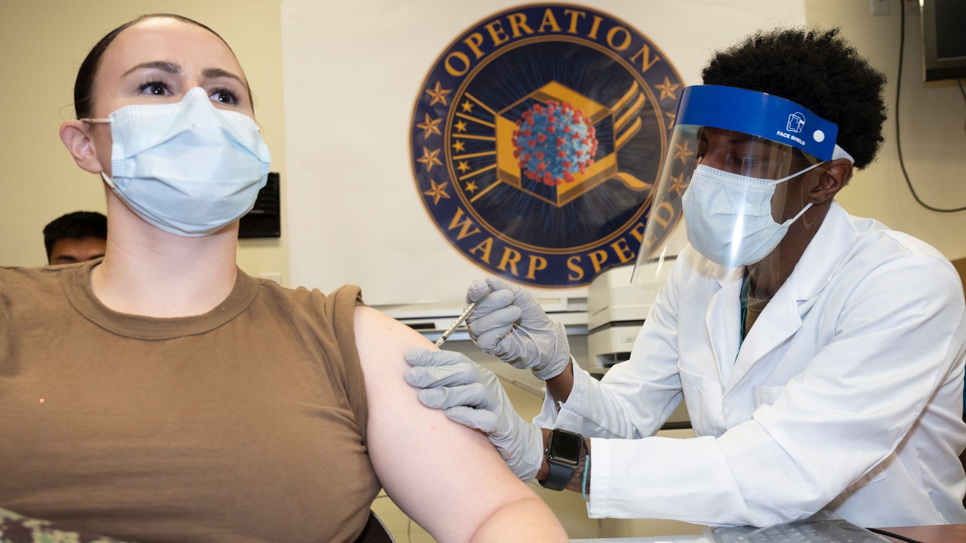 A Navy Petty Officerreceives a COVID-19 vaccination, Walter Reed National Military Medical Center, Bethesda, Md., Dec. 14, 2020. 