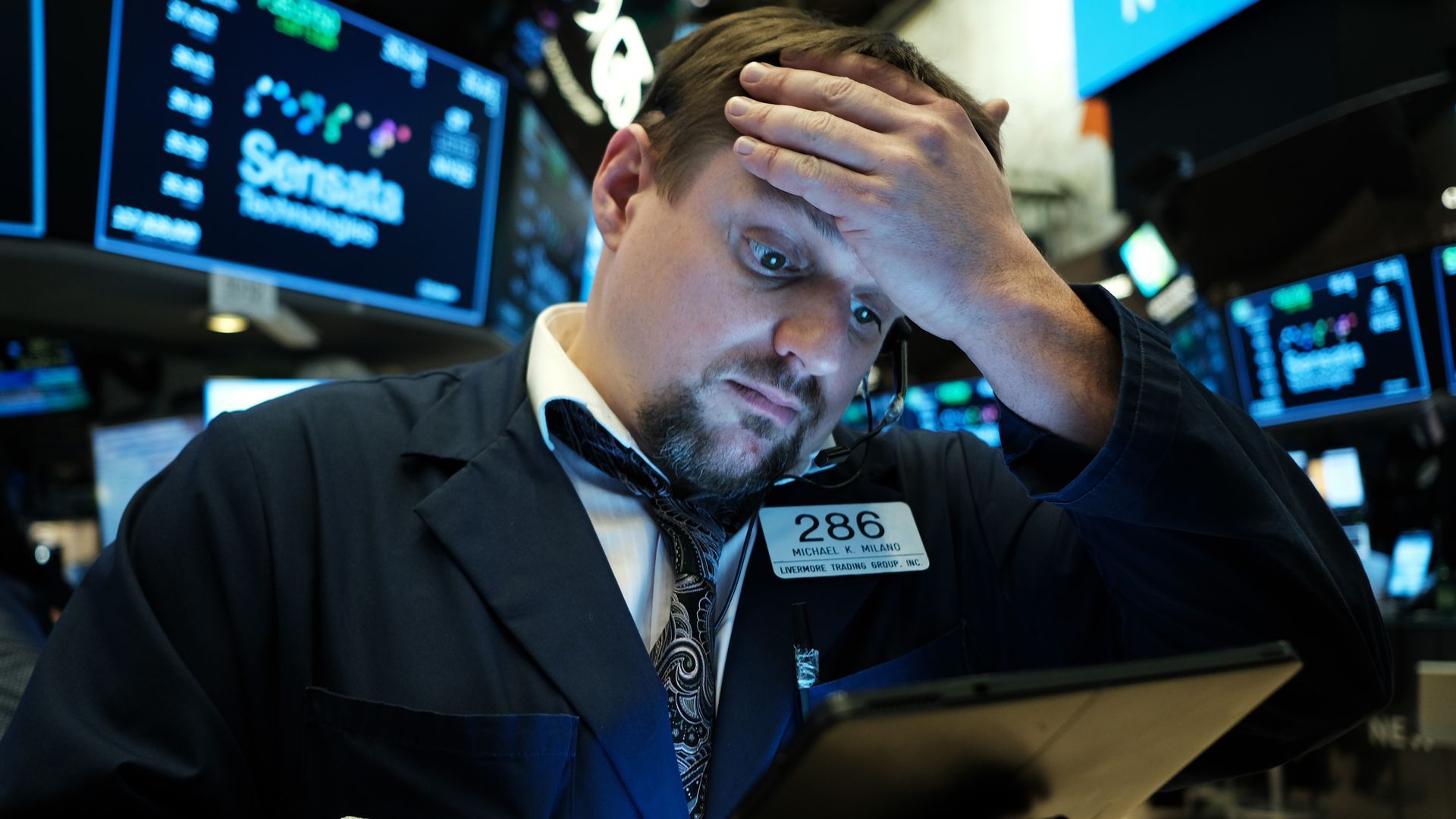 Traders work on the floor of the New York Stock Exchange (NYSE)