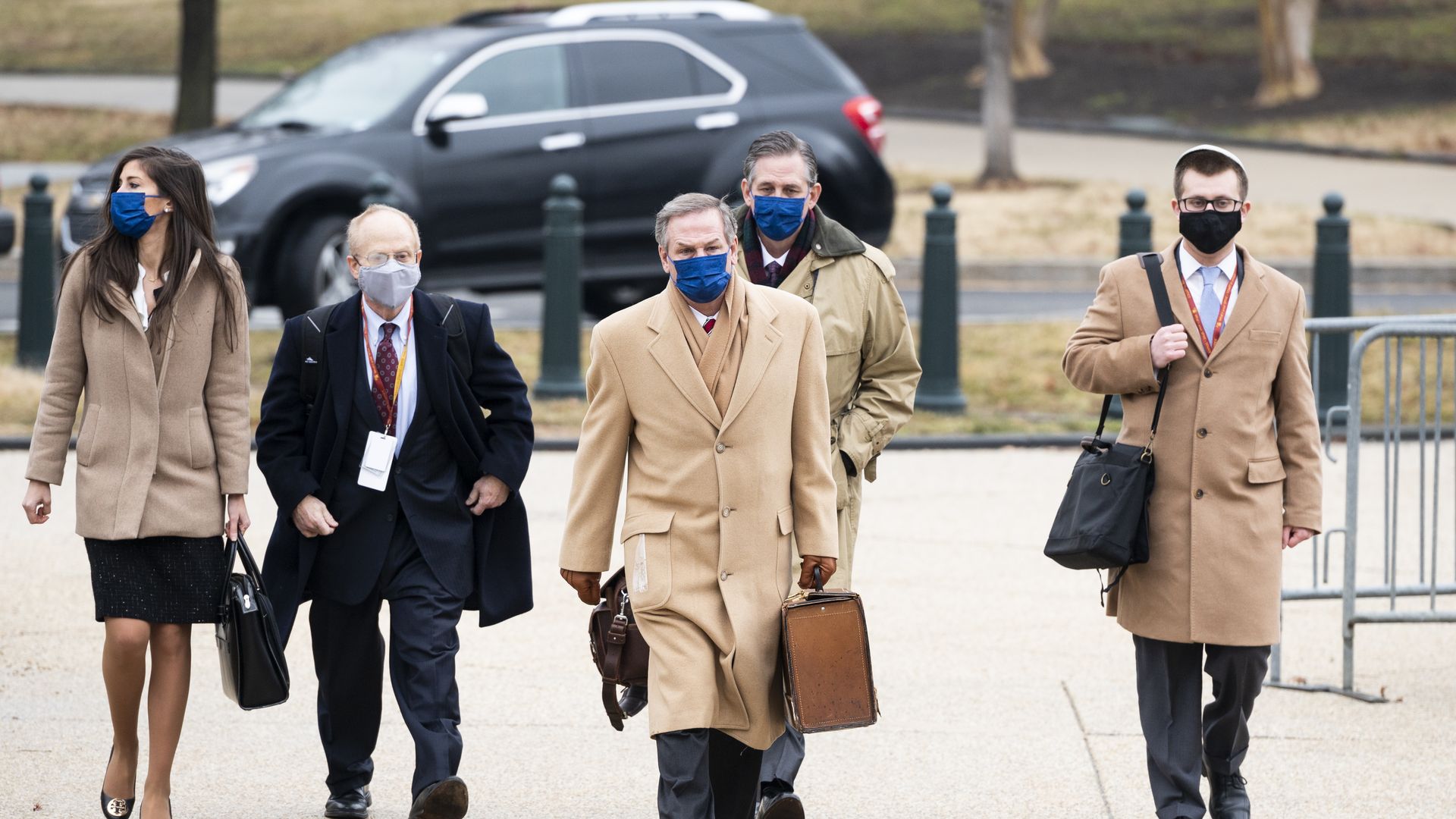  Members of former President Donald Trumps defense team, David Schoen, center left, Michael van der Veen, center, and Bruce Castor, center right, arrive at the Capitol