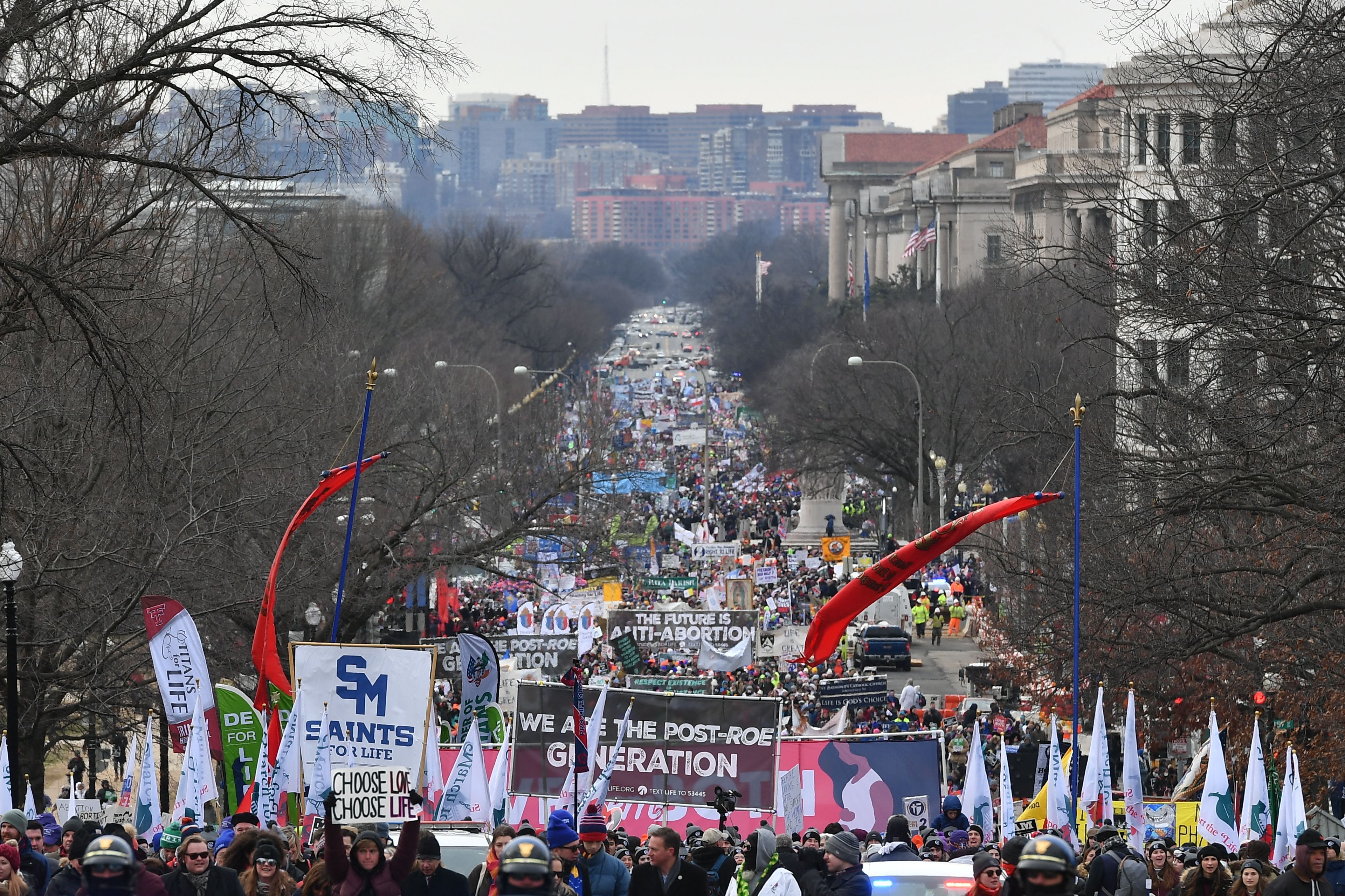 Photo of a D.C. street flooded with anti-abortion activists holding signs