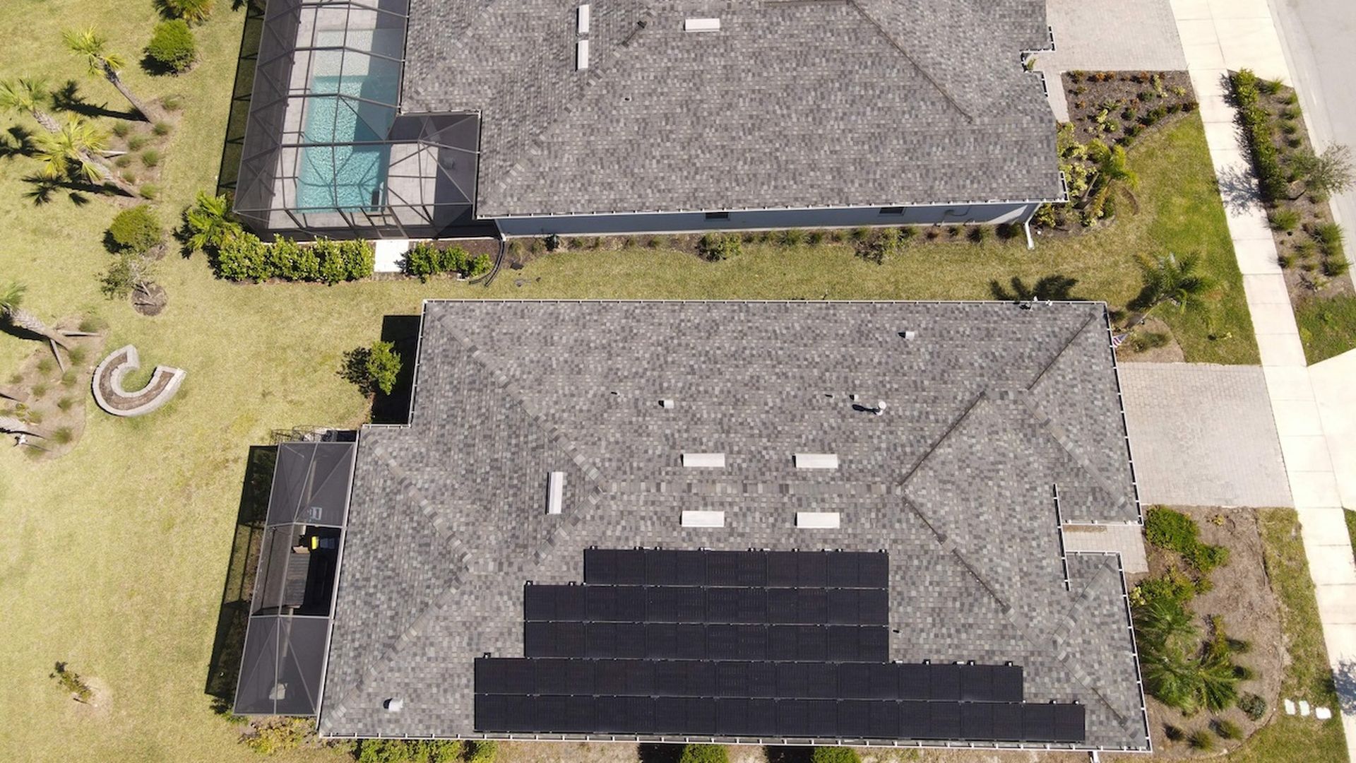 Overhead photos of solar panels on buildings in Babcock Ranch, Florida
