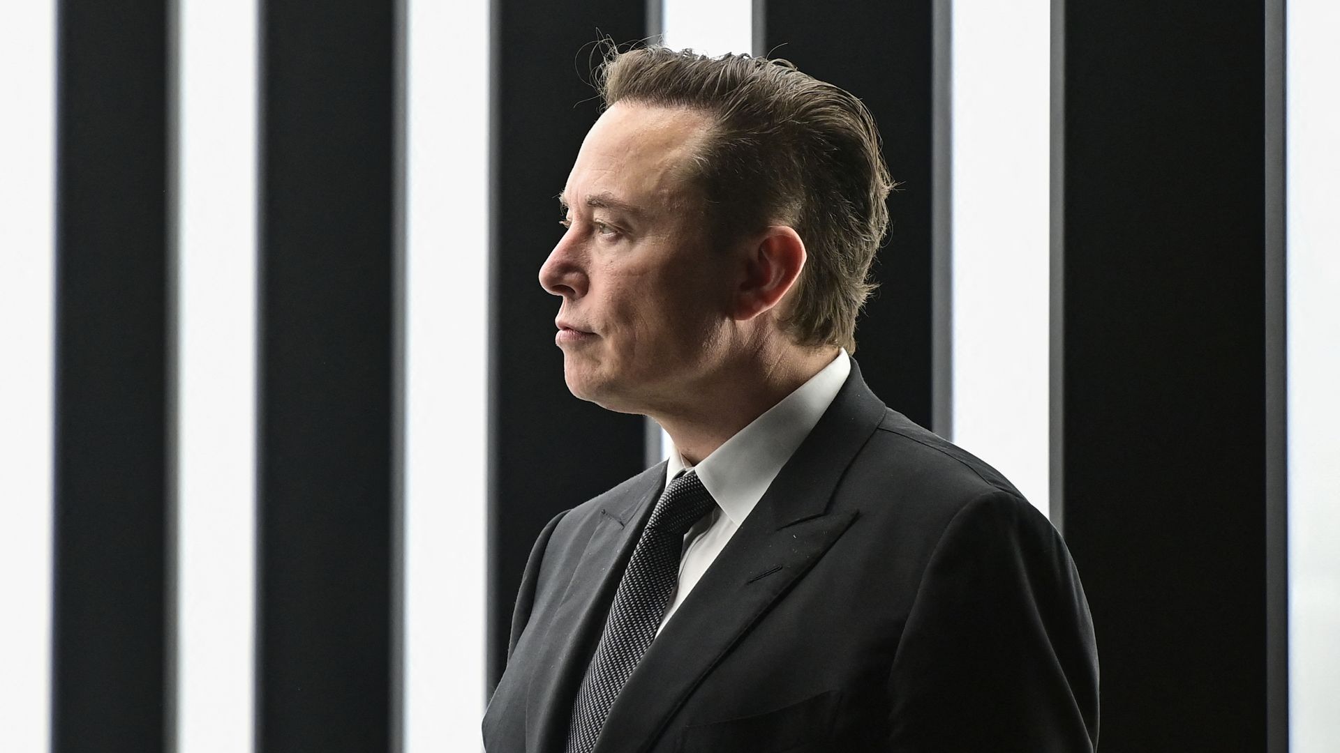 Tesla CEO Elon Musk is pictured as he attends the start of the production at Tesla's "Gigafactory" on March 22, 2022 in Gruenheide, southeast of Berlin.