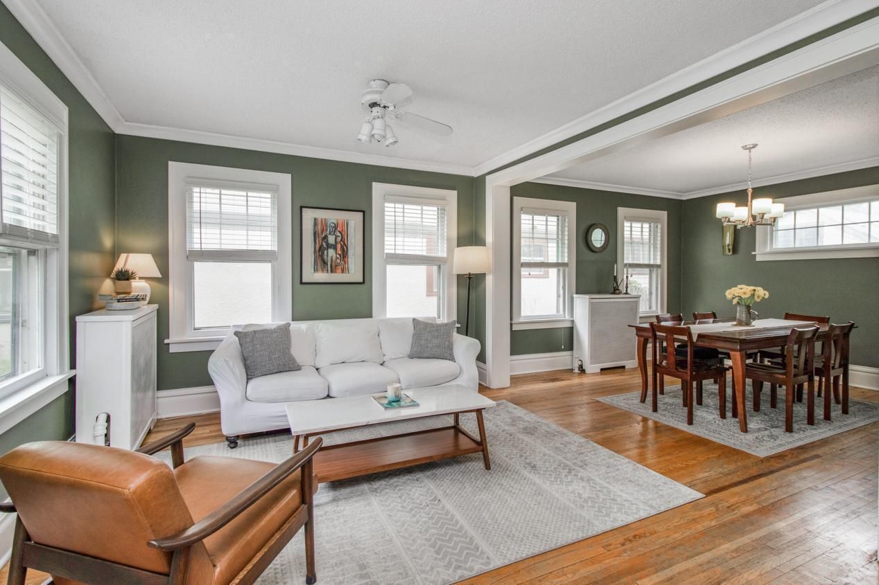 open concept living room with view of dining room