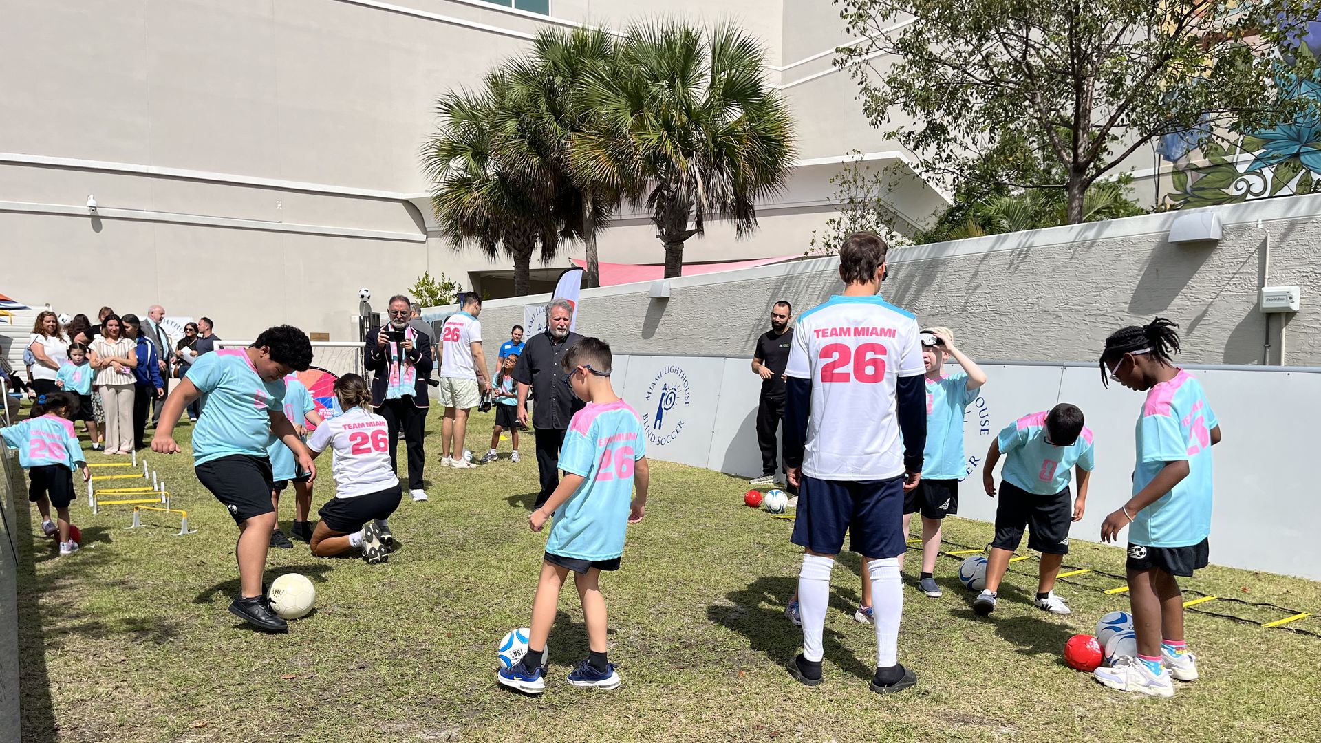 Children play blind soccer at Miami Lighthouse for the Blind and Visually Impaired
