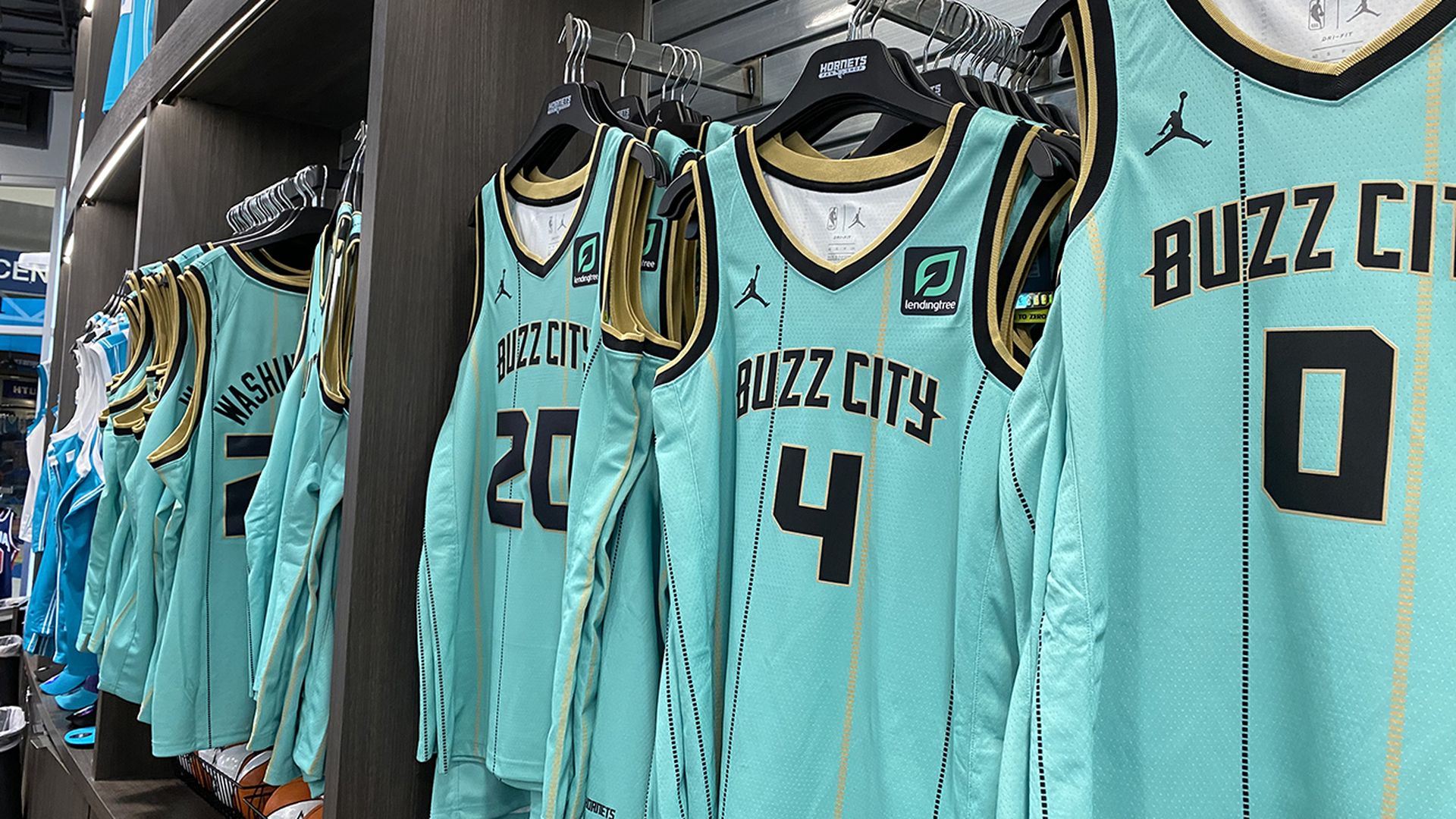 Charlotte Hornets Buzz City jerseys with numbers 25, 4, and 0