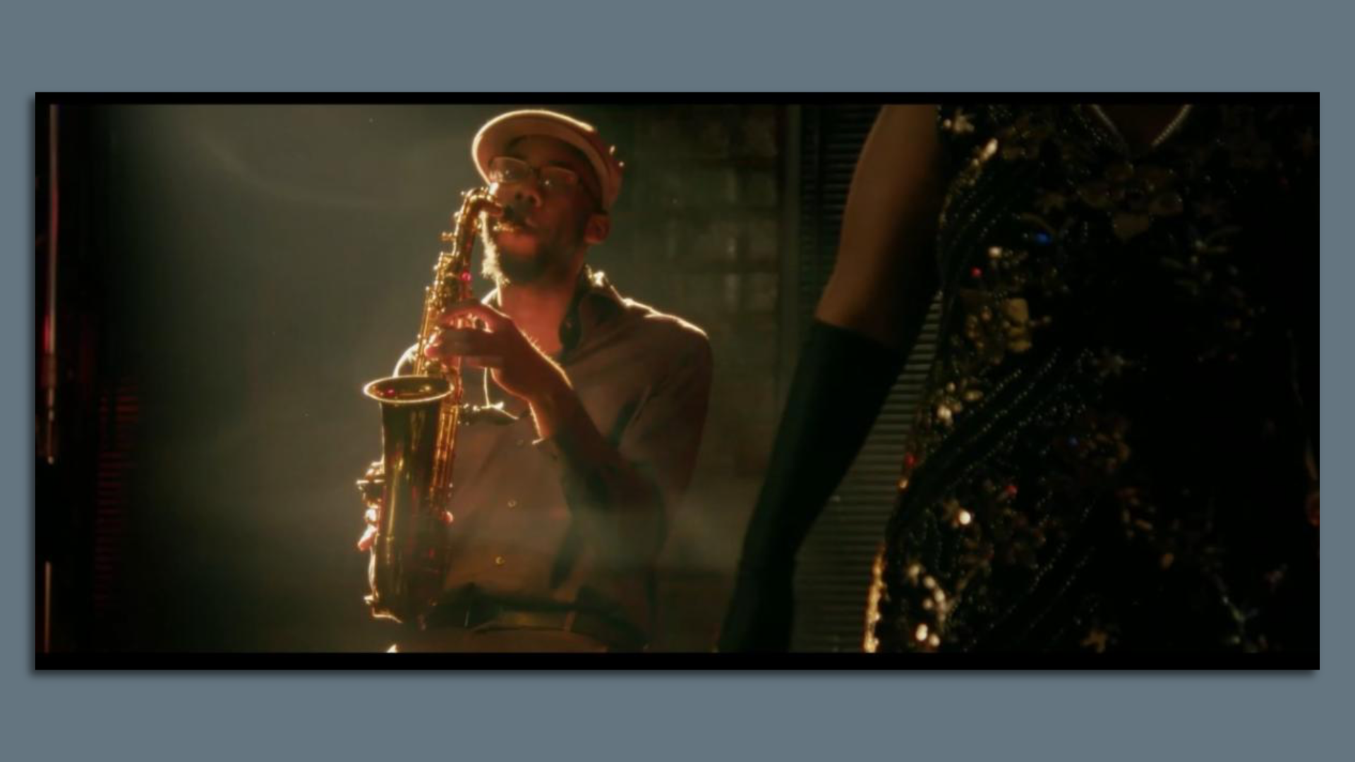 A photo of a saxophone player.