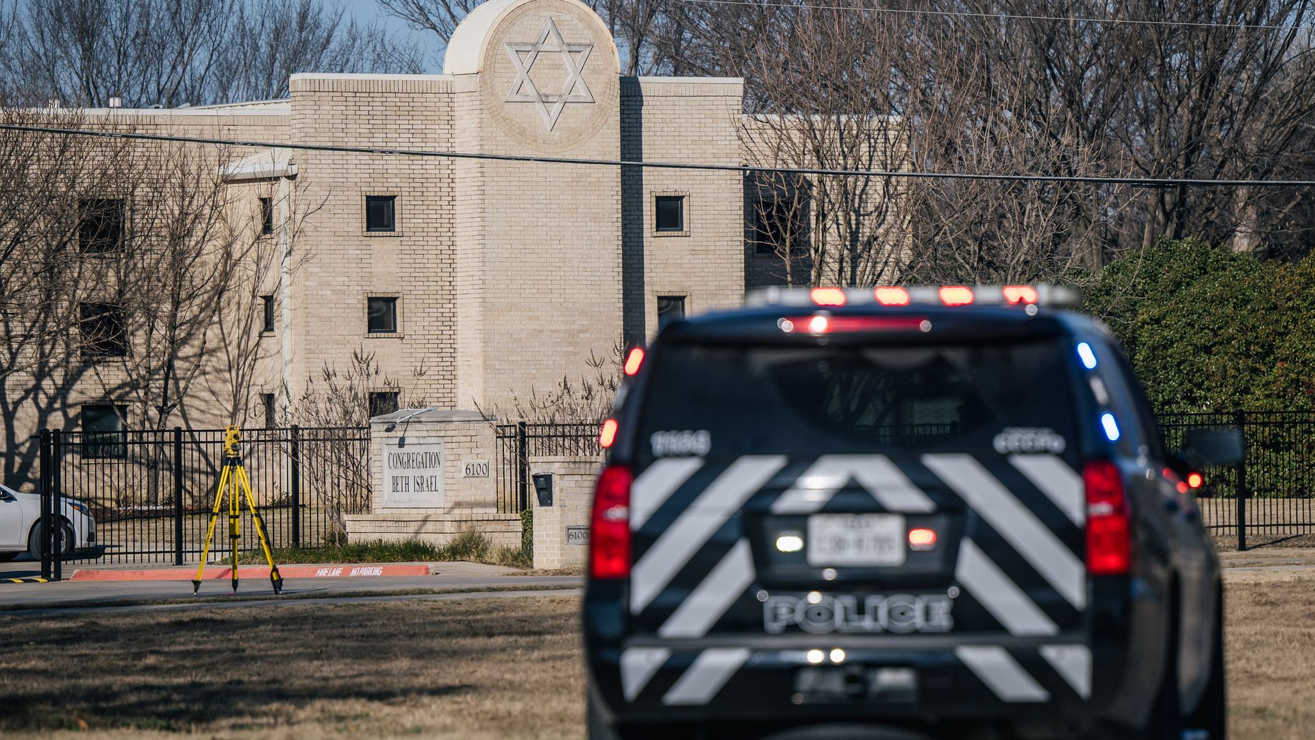 A police vehicle outside a synagogue