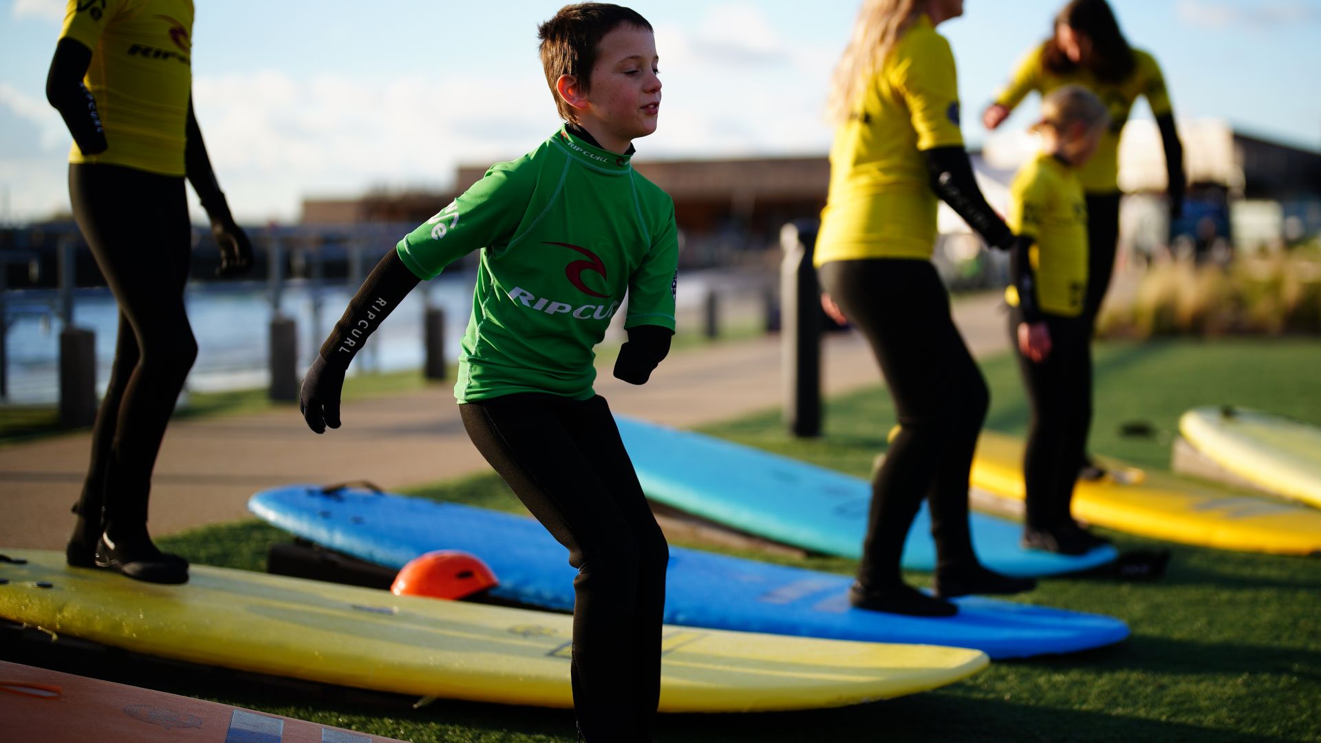 Dexter Weldin, aged nine, practices before surfing at The Wave in Bristol.