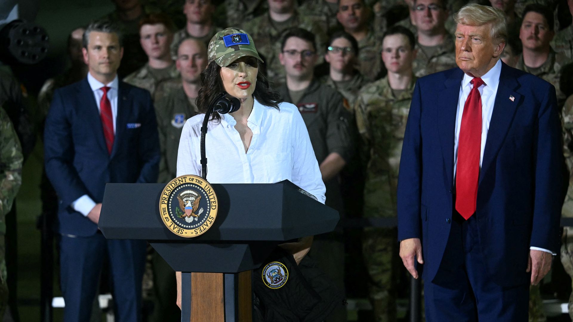 Gov. Gretchen Whitmer speaks as President Trump looks on at Selfridge Air National Guard Base last week. 