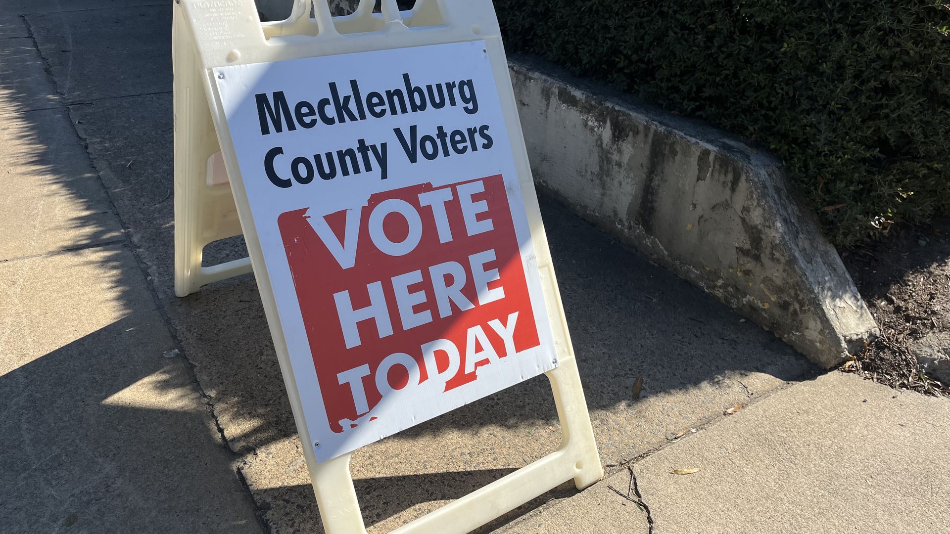 Sign that says "Vote here today"