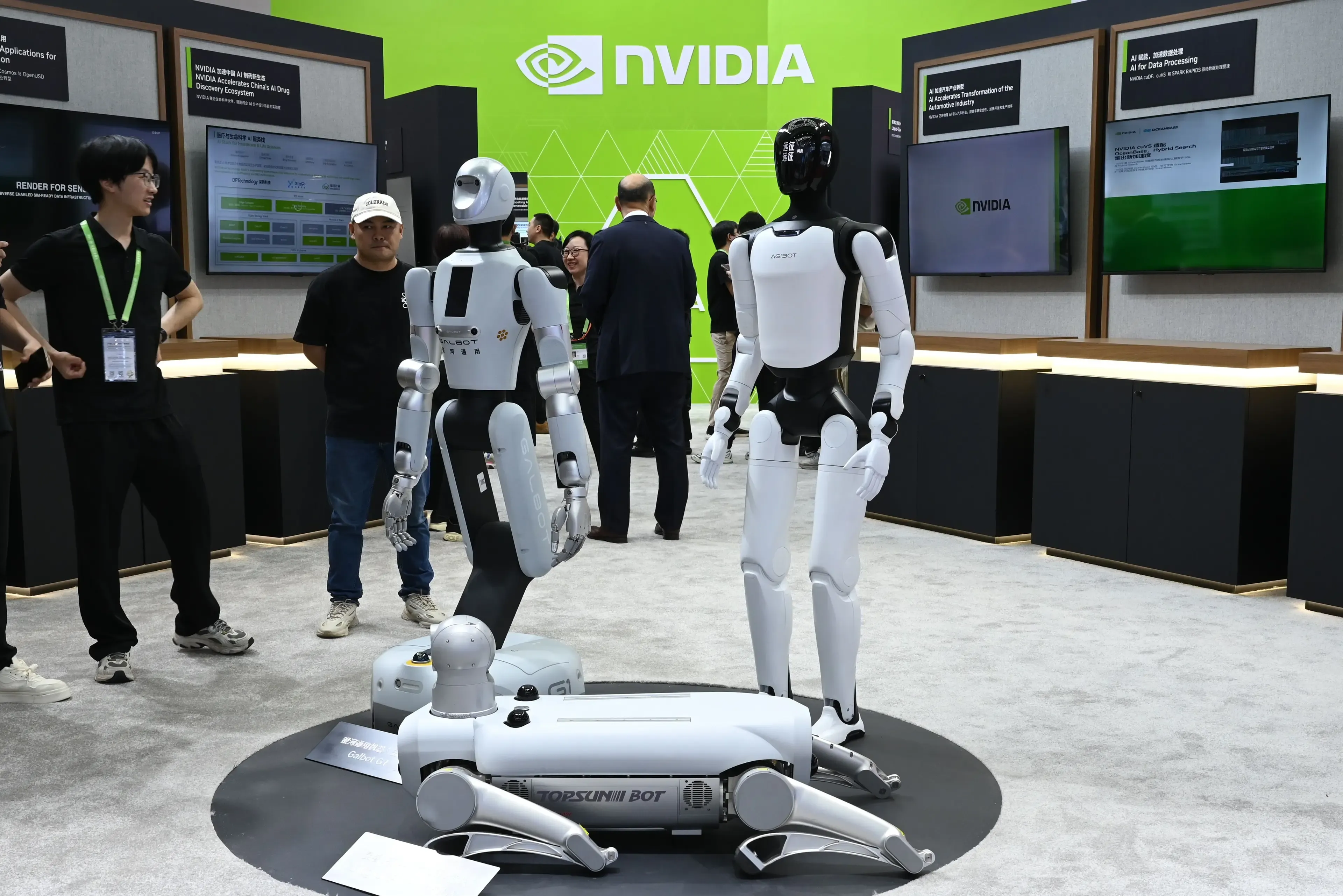 Humanoid robots on display at the Nvidia booth during the Supply Chain Expo in China yesterday. Photo: Johannes Neudecker/picture alliance via Getty Images
