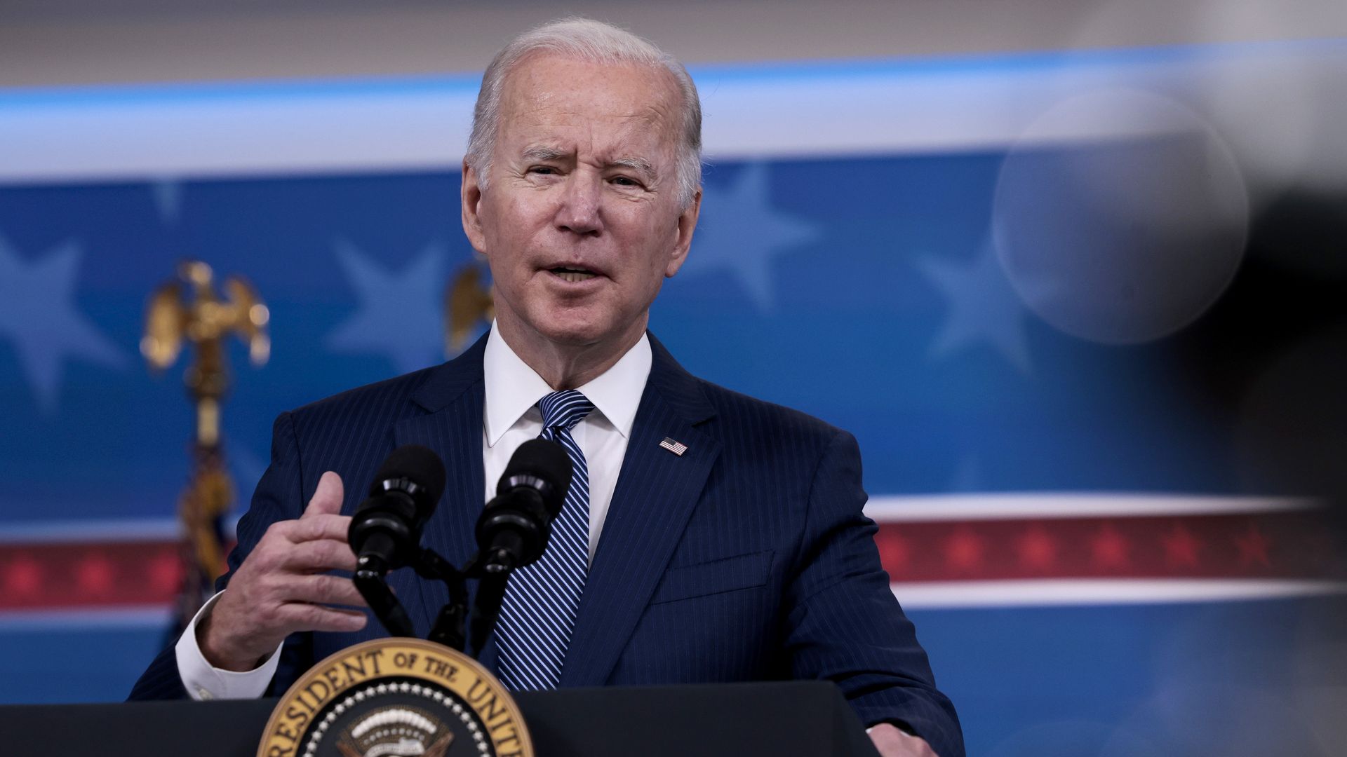 President Biden gestures as he delivers remarks on the economy and the high price of goods during the holidays.