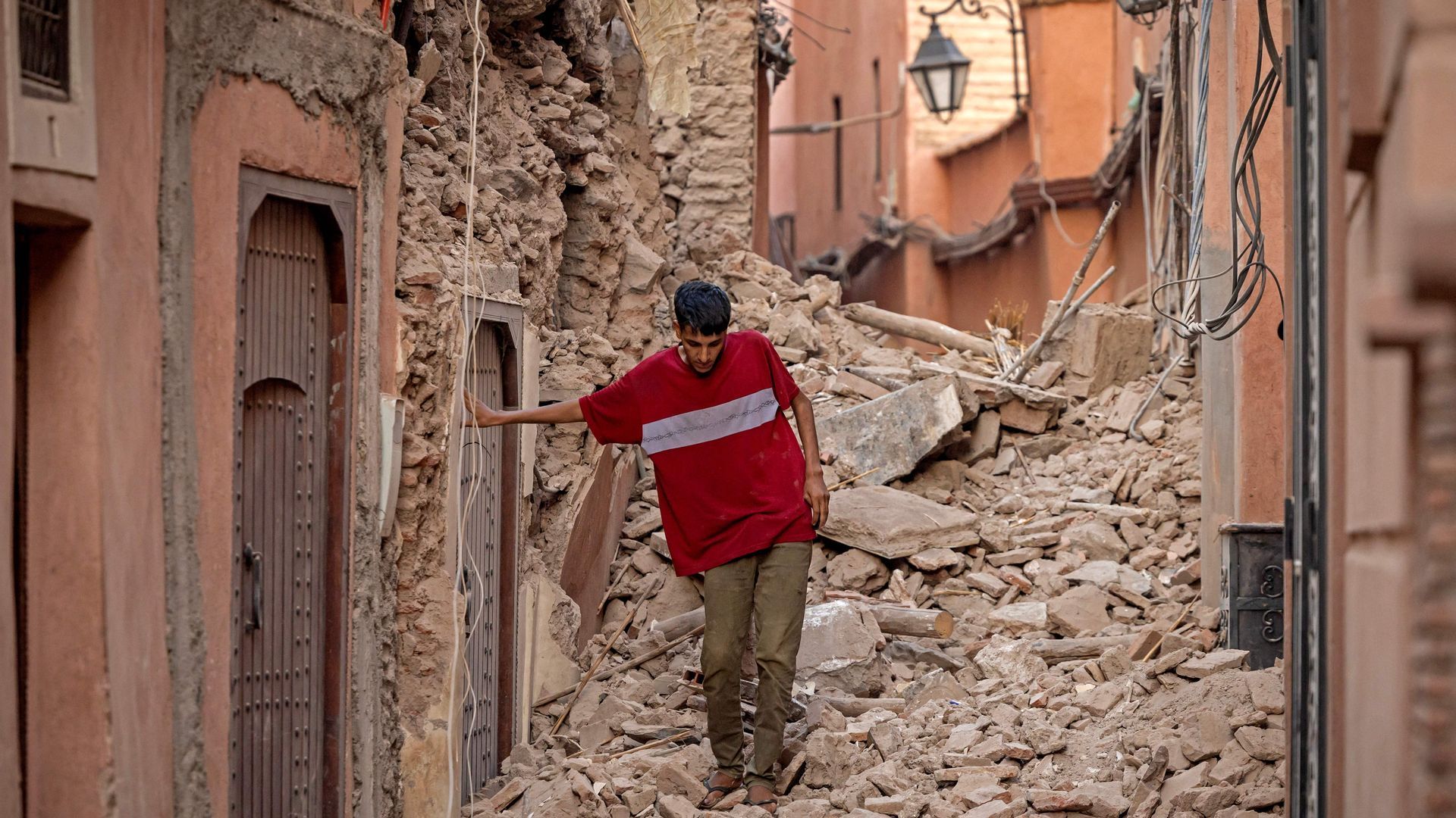 A resident navigates through the rubble in Morocco's Marrakesh following a powerful quake. Photo: Fadel Senna/AFP via Getty Images
