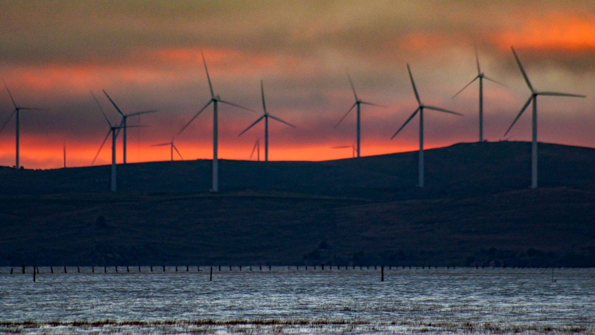 Australian wind turbines during sunset