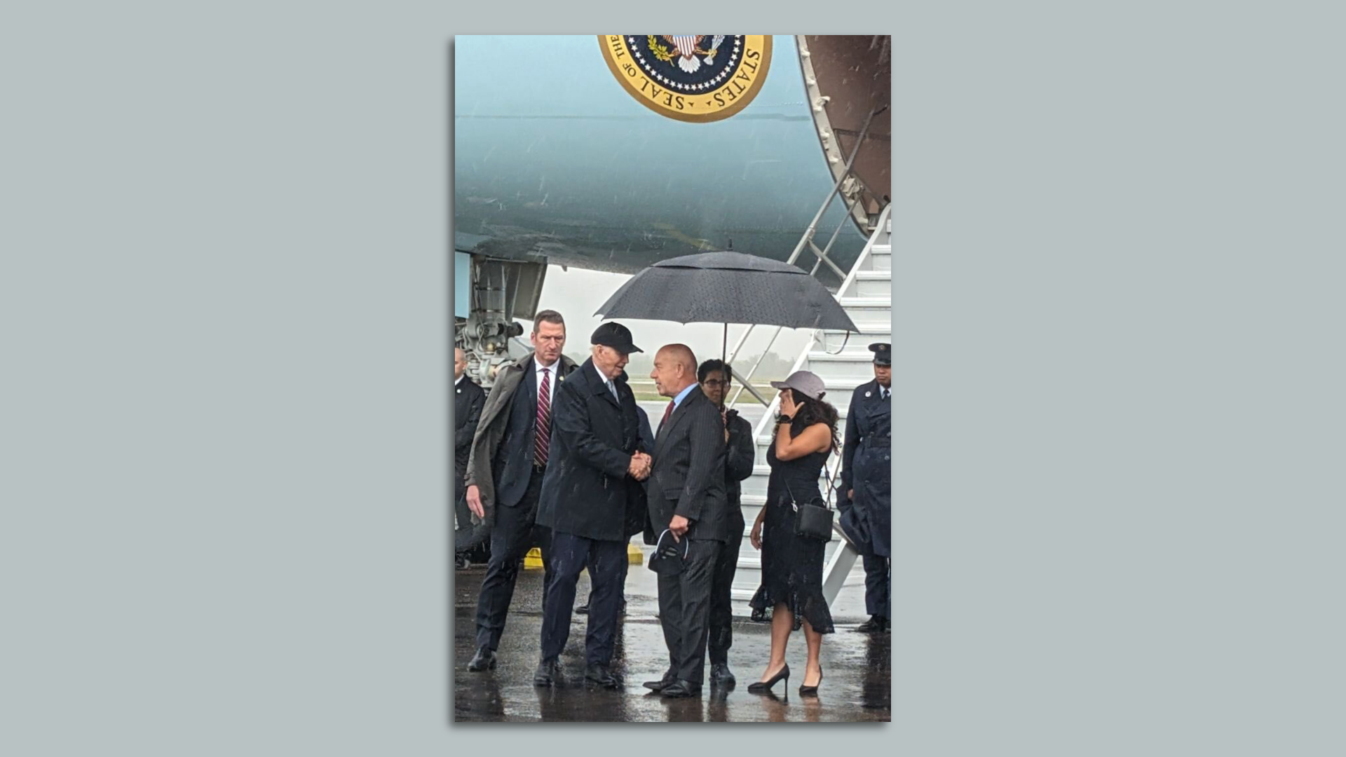 President Joe Biden shakes hands with Houston Mayor John Whitmire 