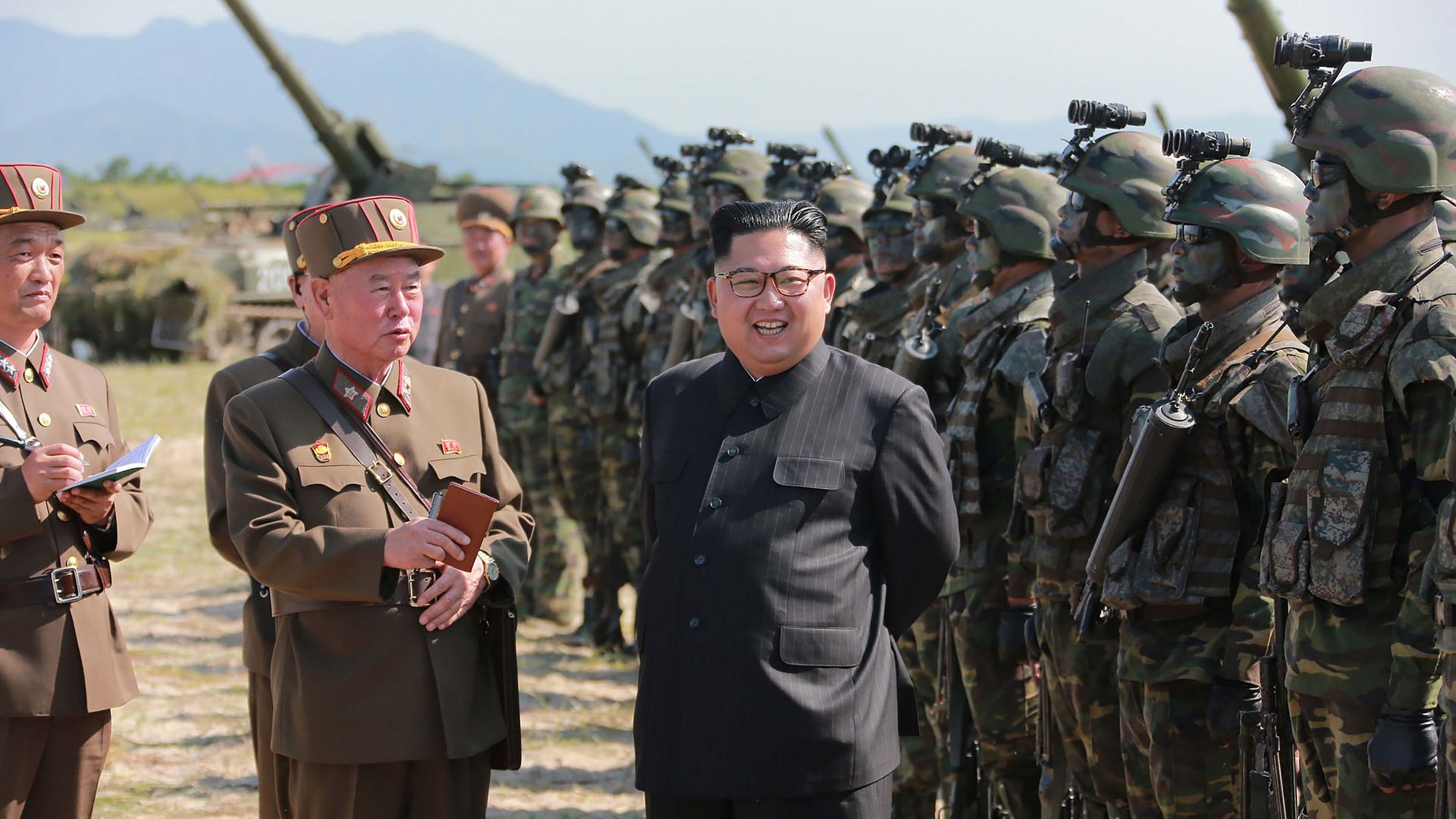 Kim Jong-un stands before the Korean People's Army.