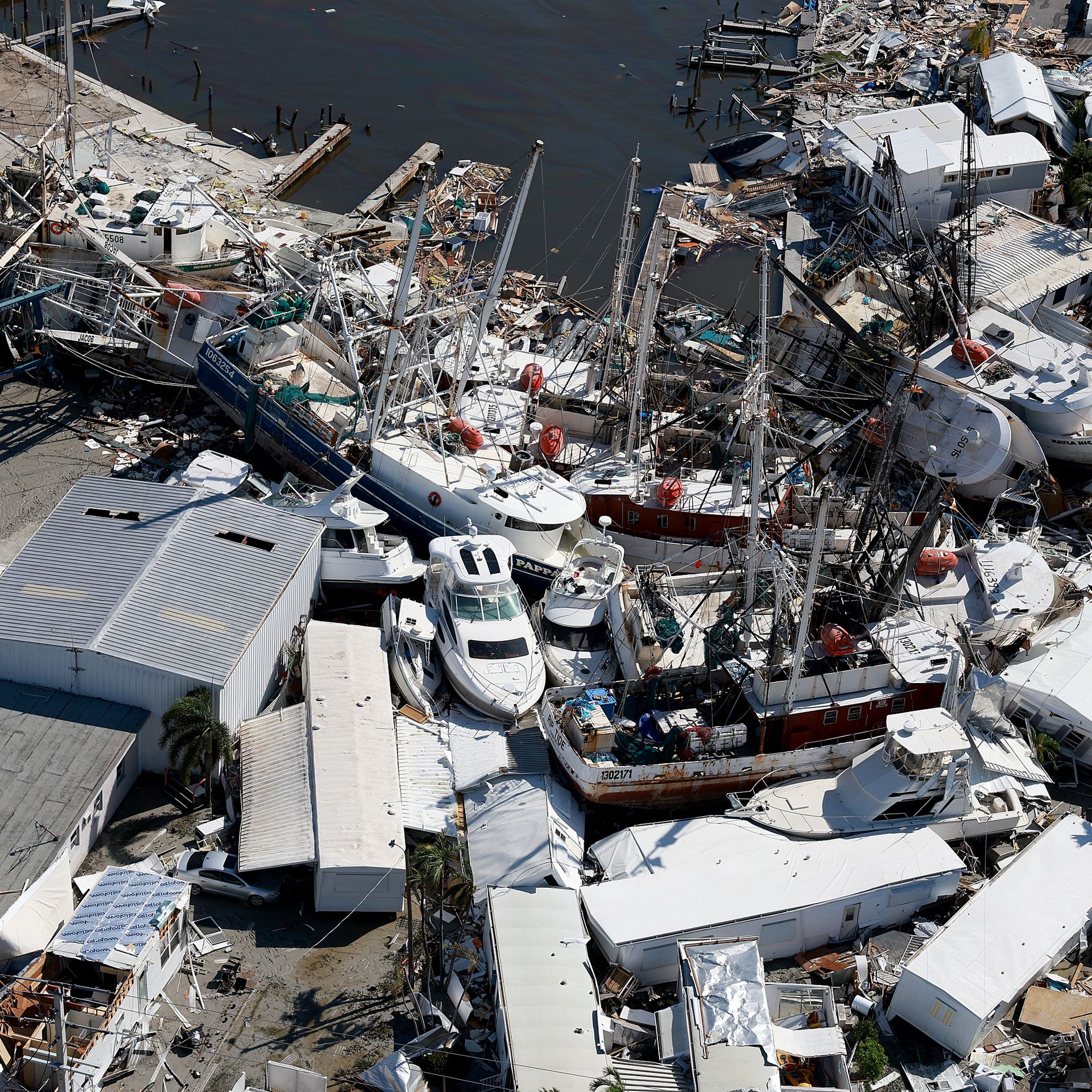 Boats are piled on top of each other on Sept. 29 after Hurricane Ian hit Fort Myer Beach.
