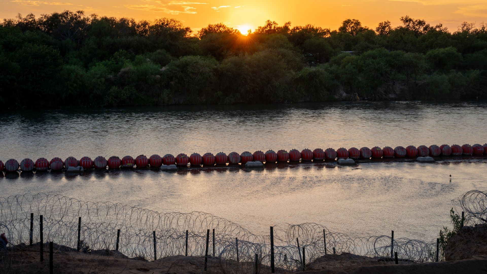 Buoy barriers with blades are seen situated in the Rio Grande on September 11, 2023 in Eagle Pass, Texas. 
