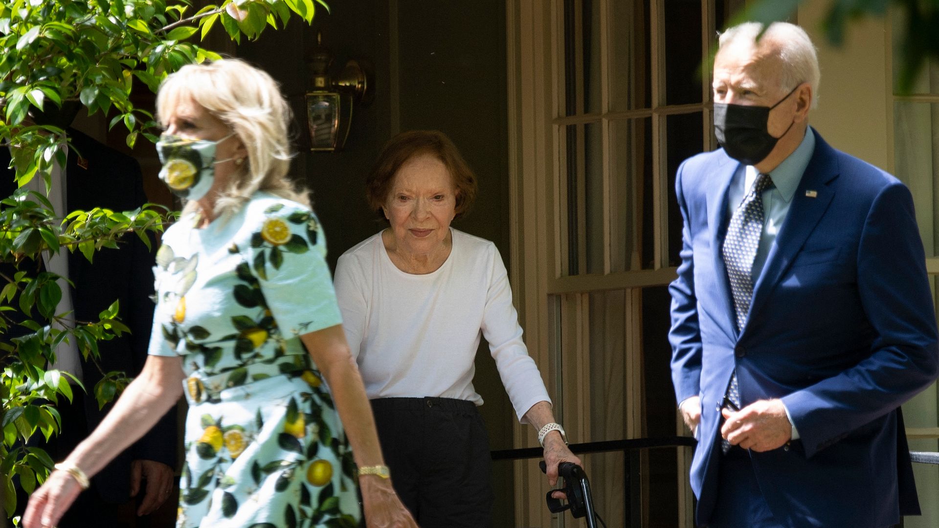 Former First Lady Rosalynn Carter (C) walks US President Joe Biden and US first lady Dr. Jill Biden out after they after visited former US President Jimmy Carter, April 29, 2021, in Plains, Georgia.