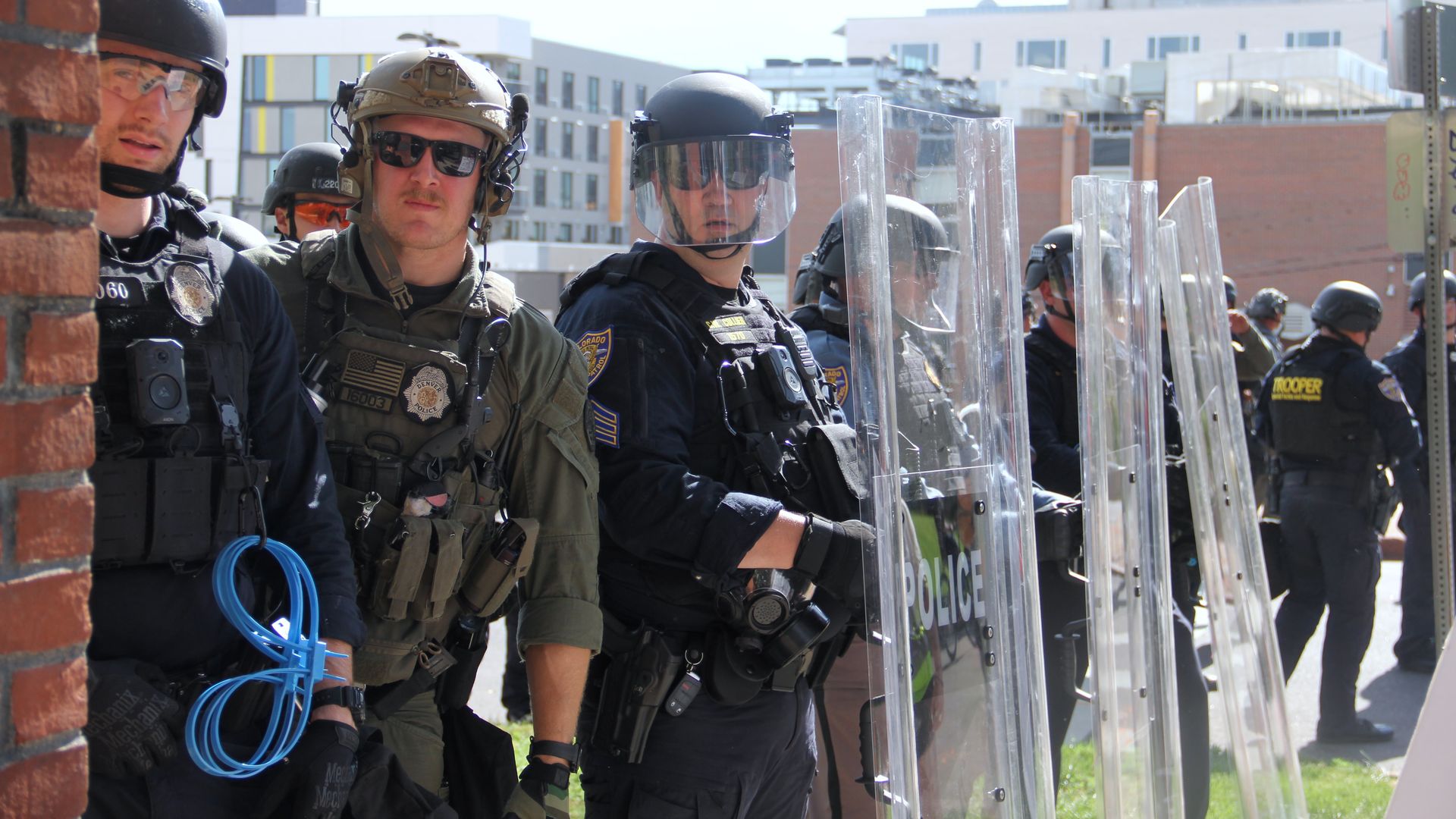 Several police officers in riot gear.