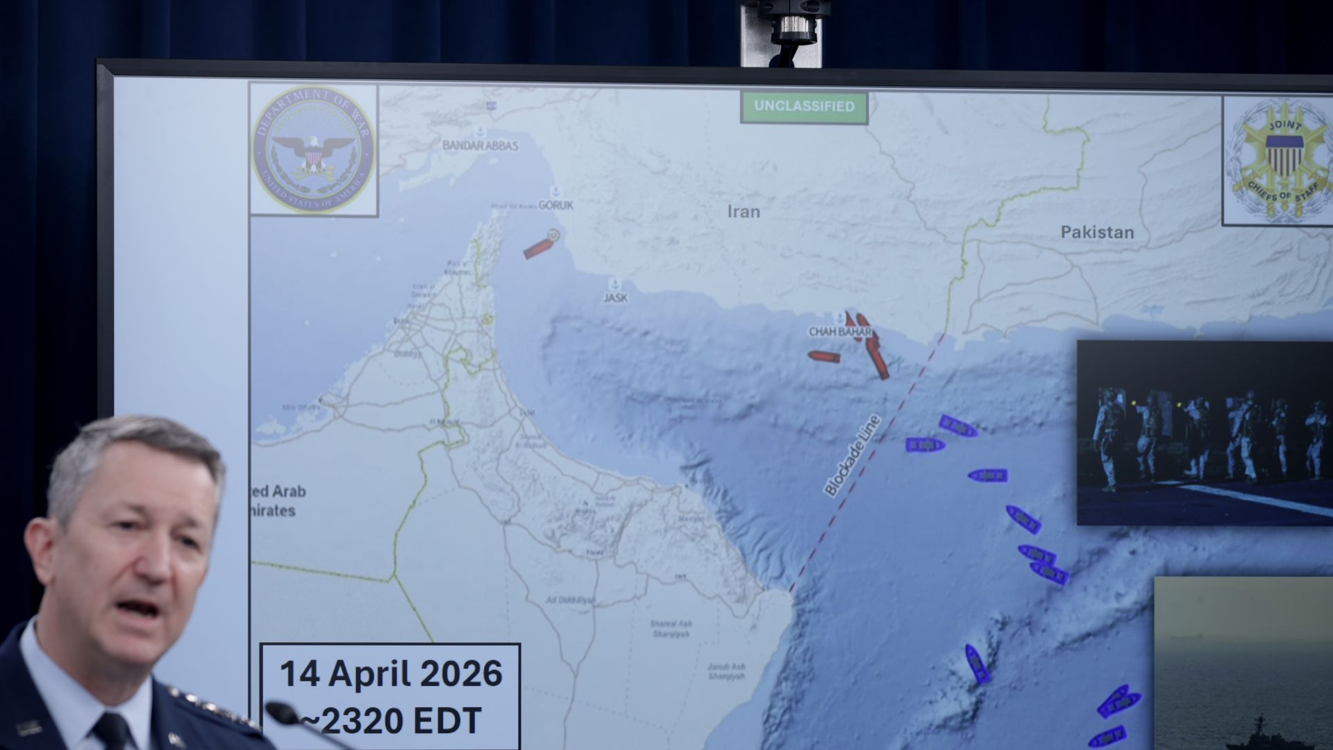Joint Chiefs chair Gen. Dan Caine speaks in from of a map showing the U.S. blockade in the Gulf of Oman.