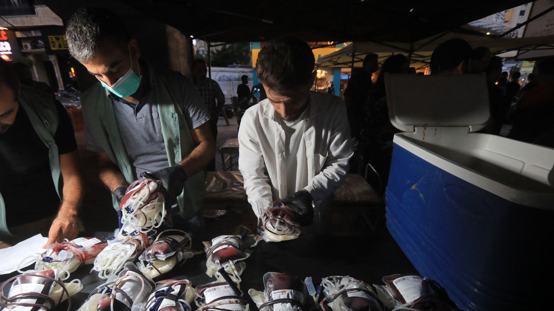 Medics collect blood donations in Beirut's southern suburb on September 17, 2024, after explosions hit locations around Lebanon amid ongoing cross-border tensions between Israel and Hezbollah fighters.