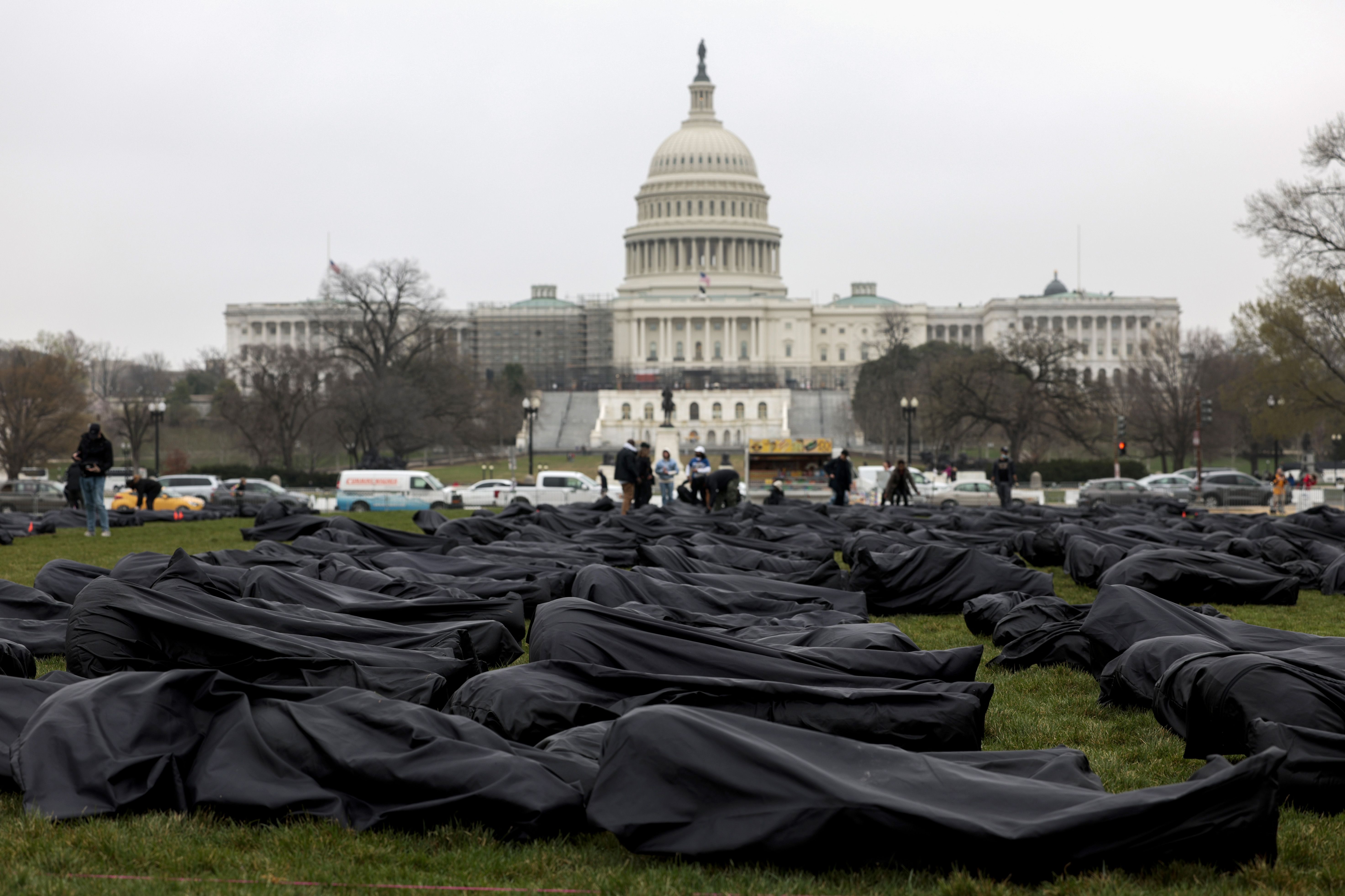 ody bags are assembled on the National Mall by gun control activist group March For Our Lives on March 24, 2022 in Washington, DC. 