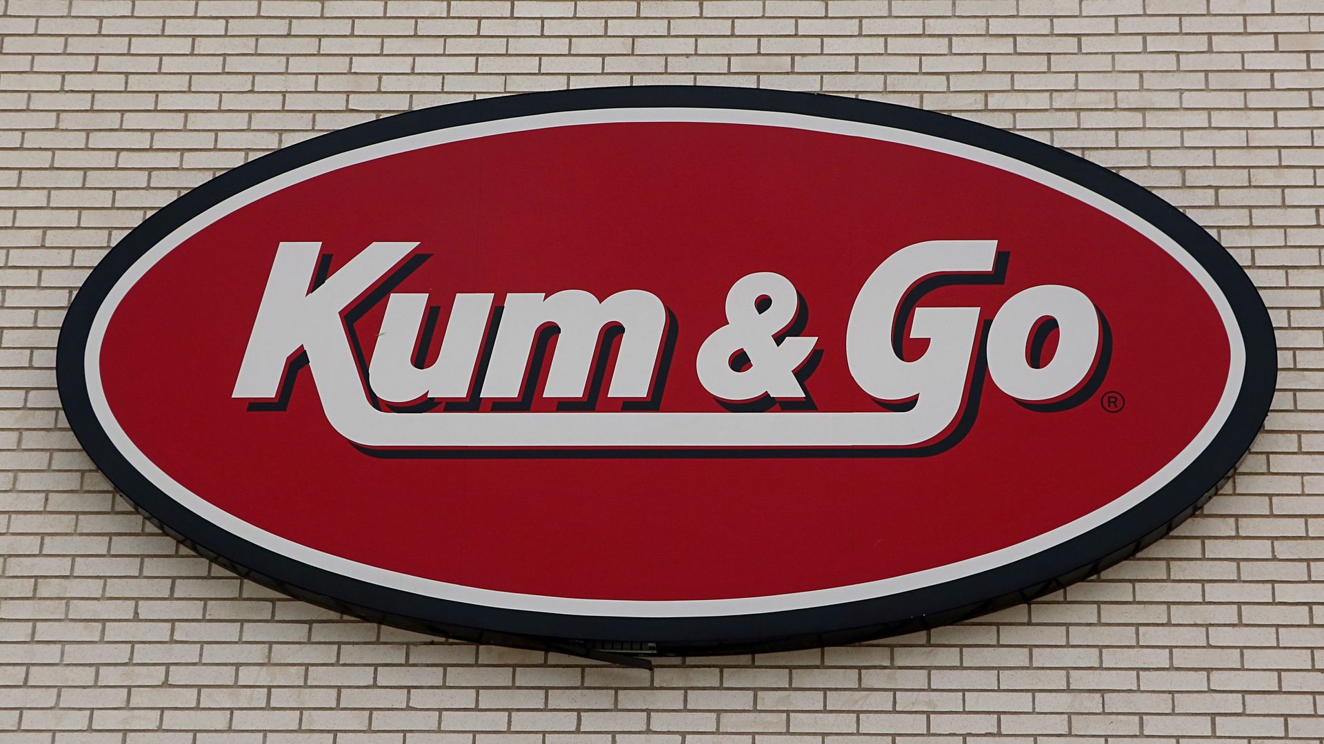 Kum & Go sign on the exterior of a shop