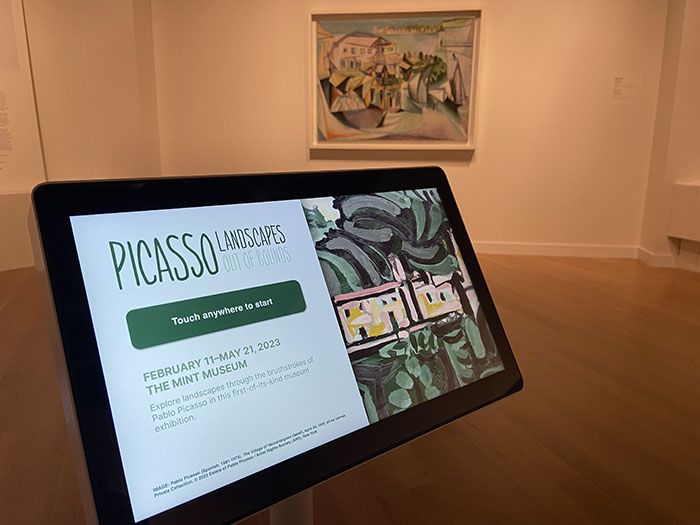 A tablet detailing Picasso's works sits in the gallery at the Mint Museum.