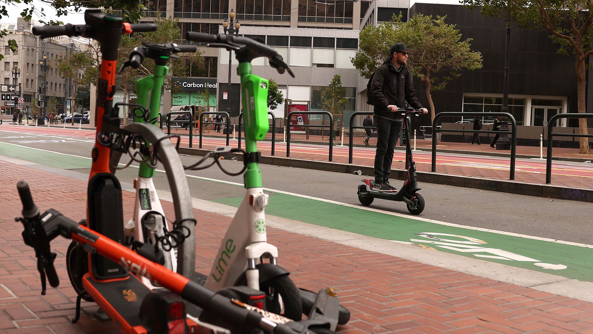 Photo of a person riding an electric scooter 