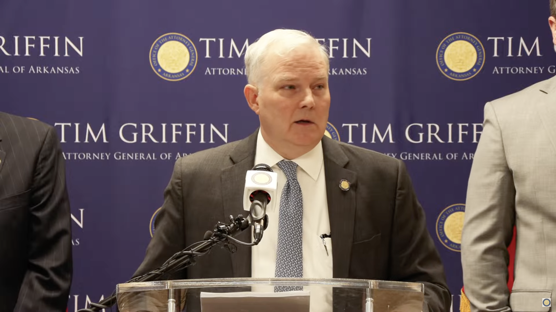 Arkansas' Attorney General Tim Griffin speaks from a podium.
