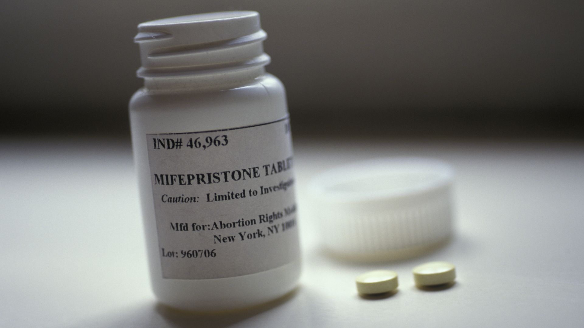 Picture of a pill bottle whose label says "mifepristone"