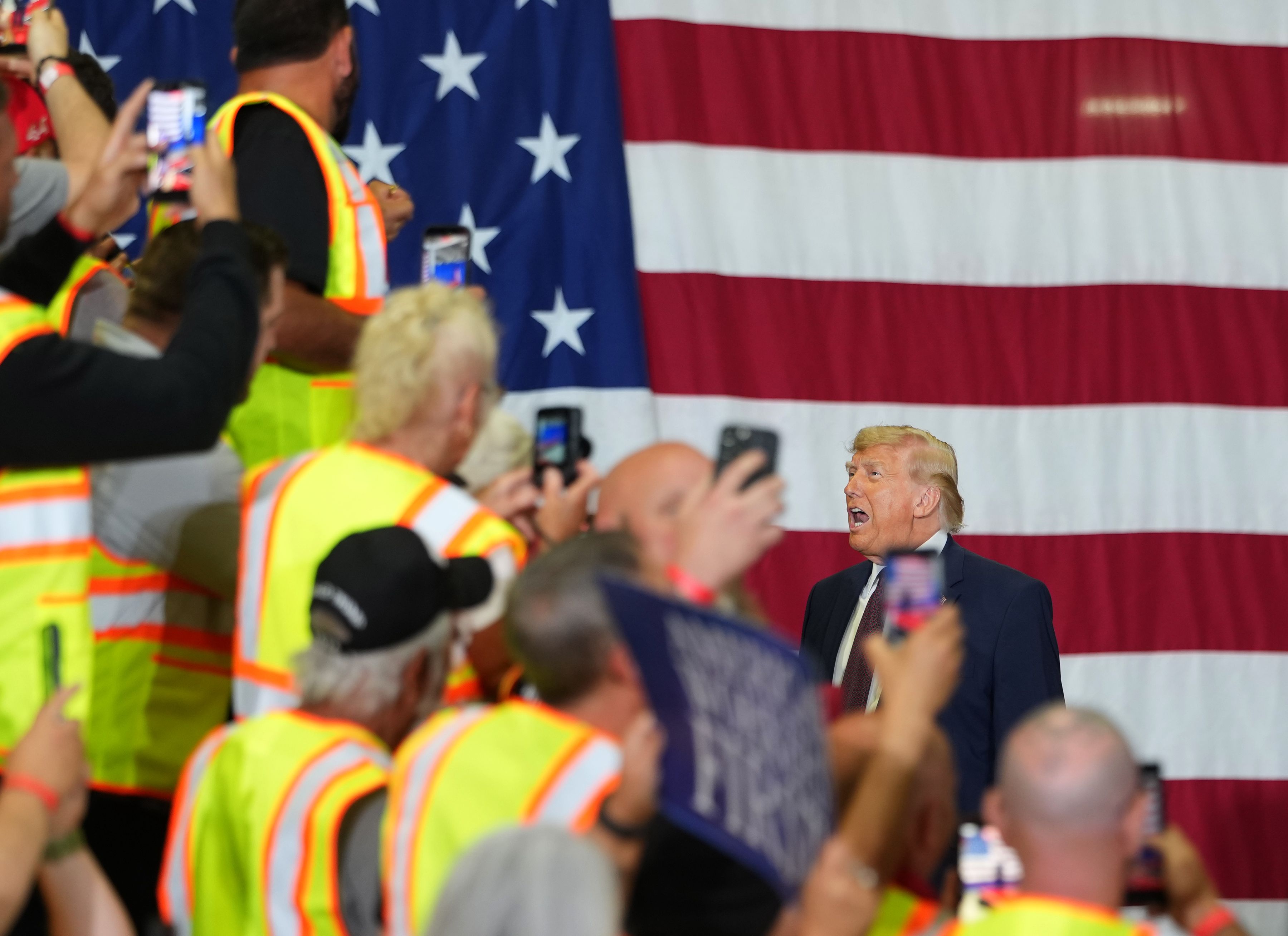 President Trump arrives before delivering remarks at the Mack Trucks manufacturing plant yesterday in Macungie, Pa.