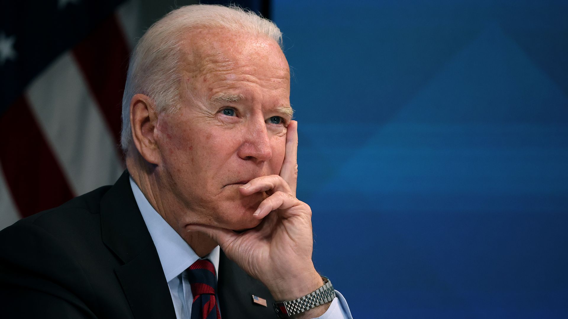 President Biden listens during a meeting in Washington, D.C.
